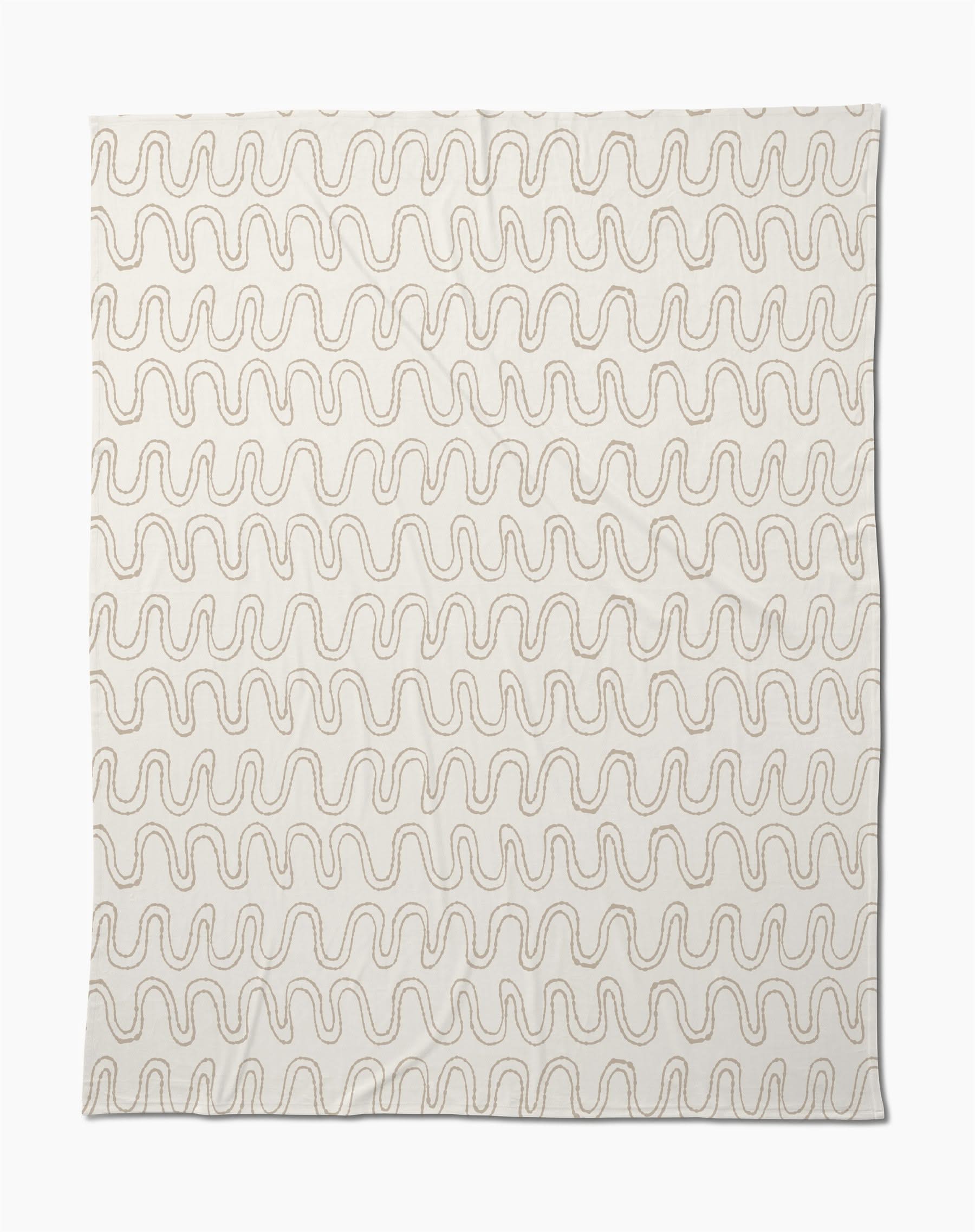 The Geometry Abstract Squiggles Butter Blanket features a cream base with repeating wavy brown lines, making this soft throw perfect for cozying up in style.