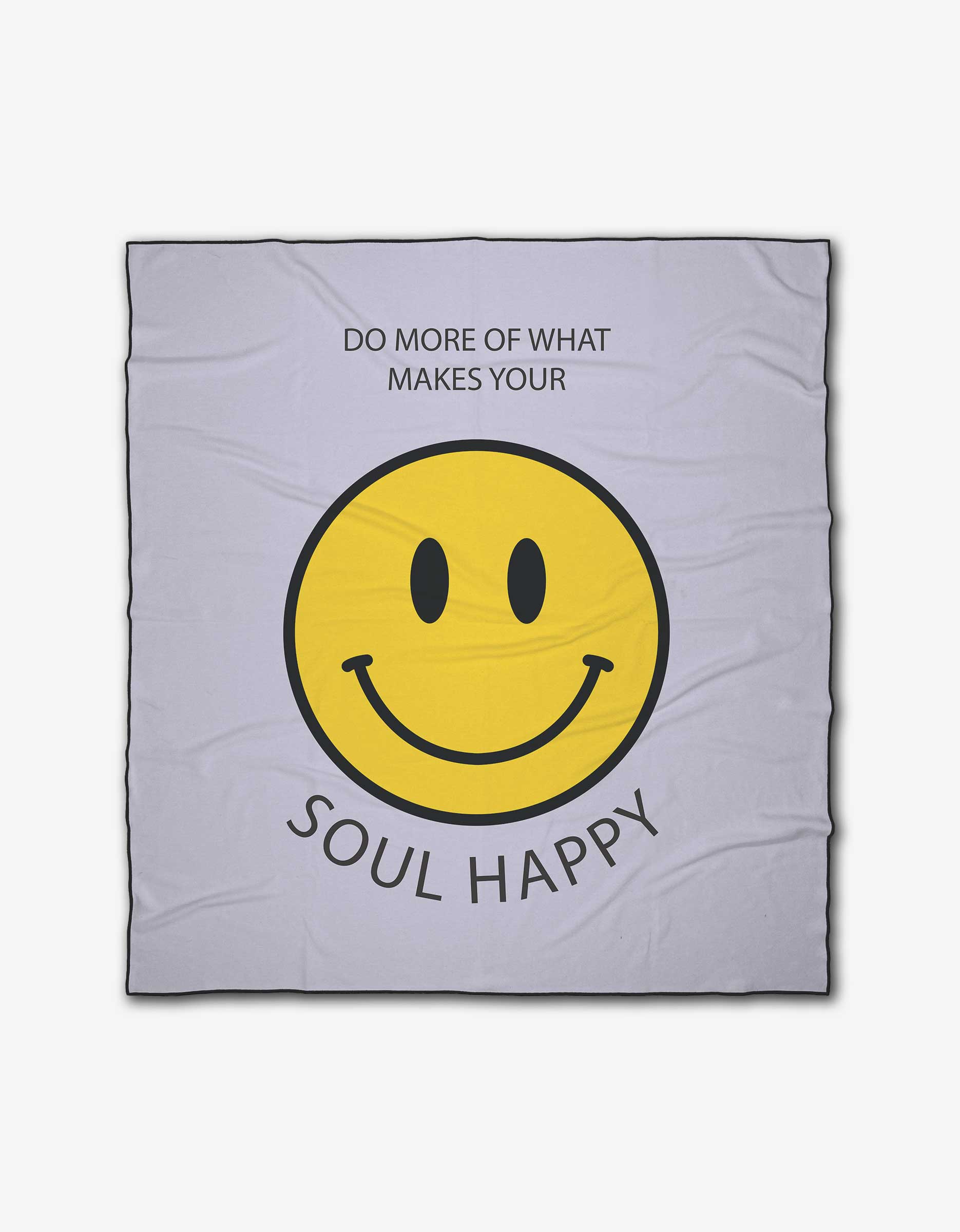 The Soul Happy beach blanket by Quotes by Christie features a large yellow smiley face and DO MORE OF WHAT MAKES YOUR SOUL HAPPY on light gray, made from recycled materials for quick-drying, eco-friendly comfort.