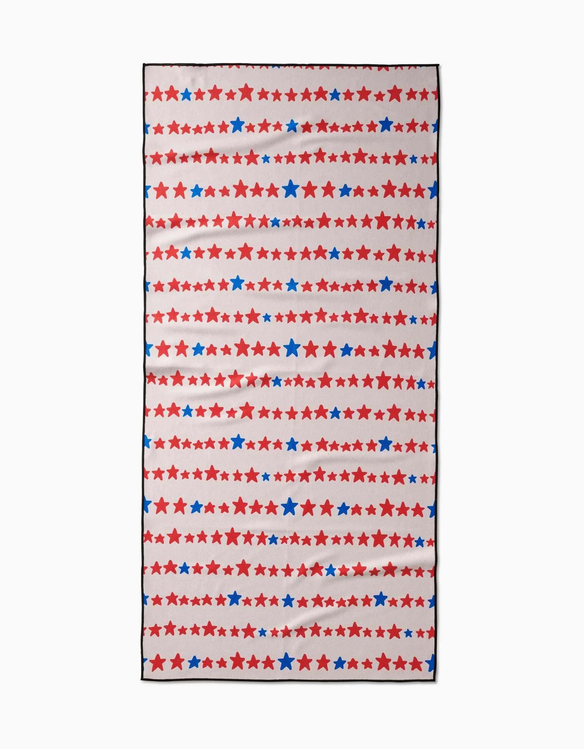 The Kayla Ann Starry Stripes towel features horizontal rows of red and blue stars in various sizes on white. Made from quick-drying, recycled micro-loop material, this rectangular beach towel has a festive, patriotic look.