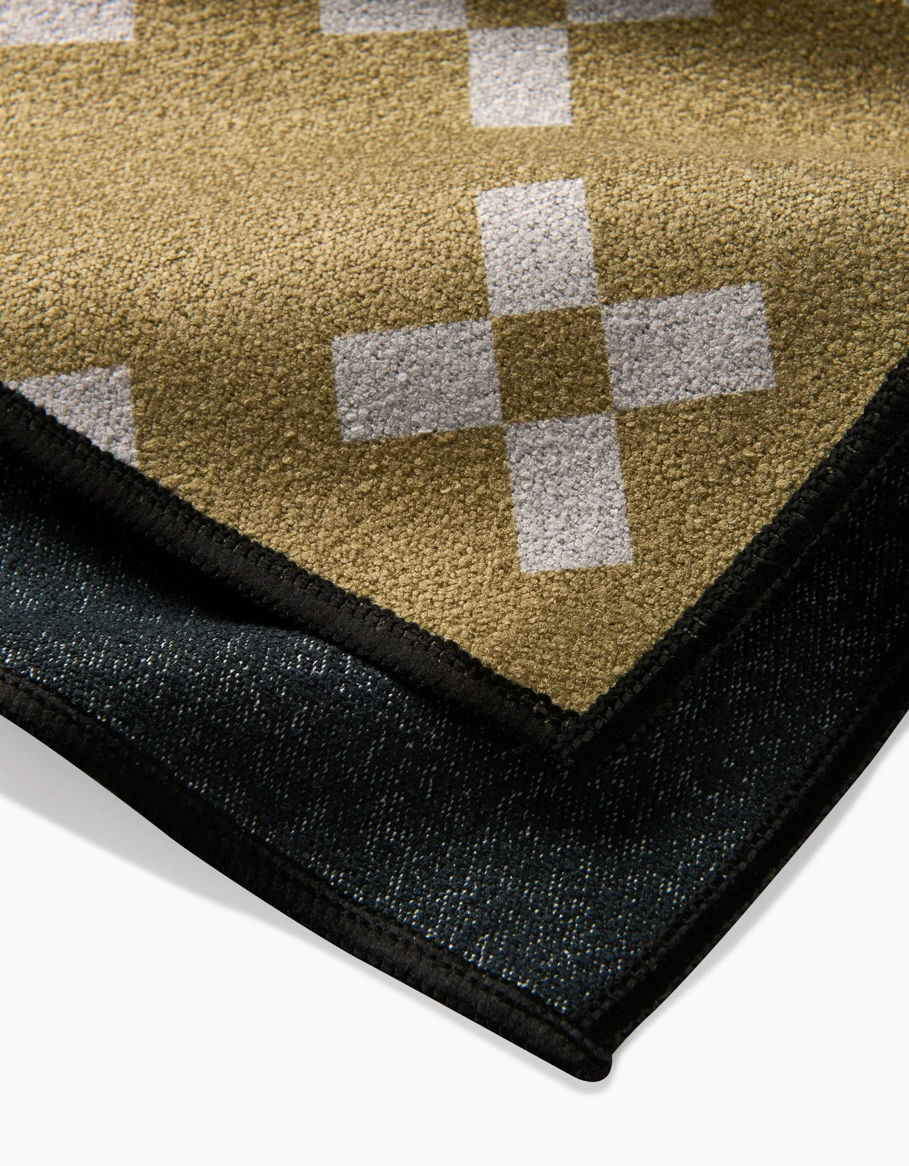 A close-up of the Lina quick-drying towel by Anna Christian, crafted from recycled materials.
