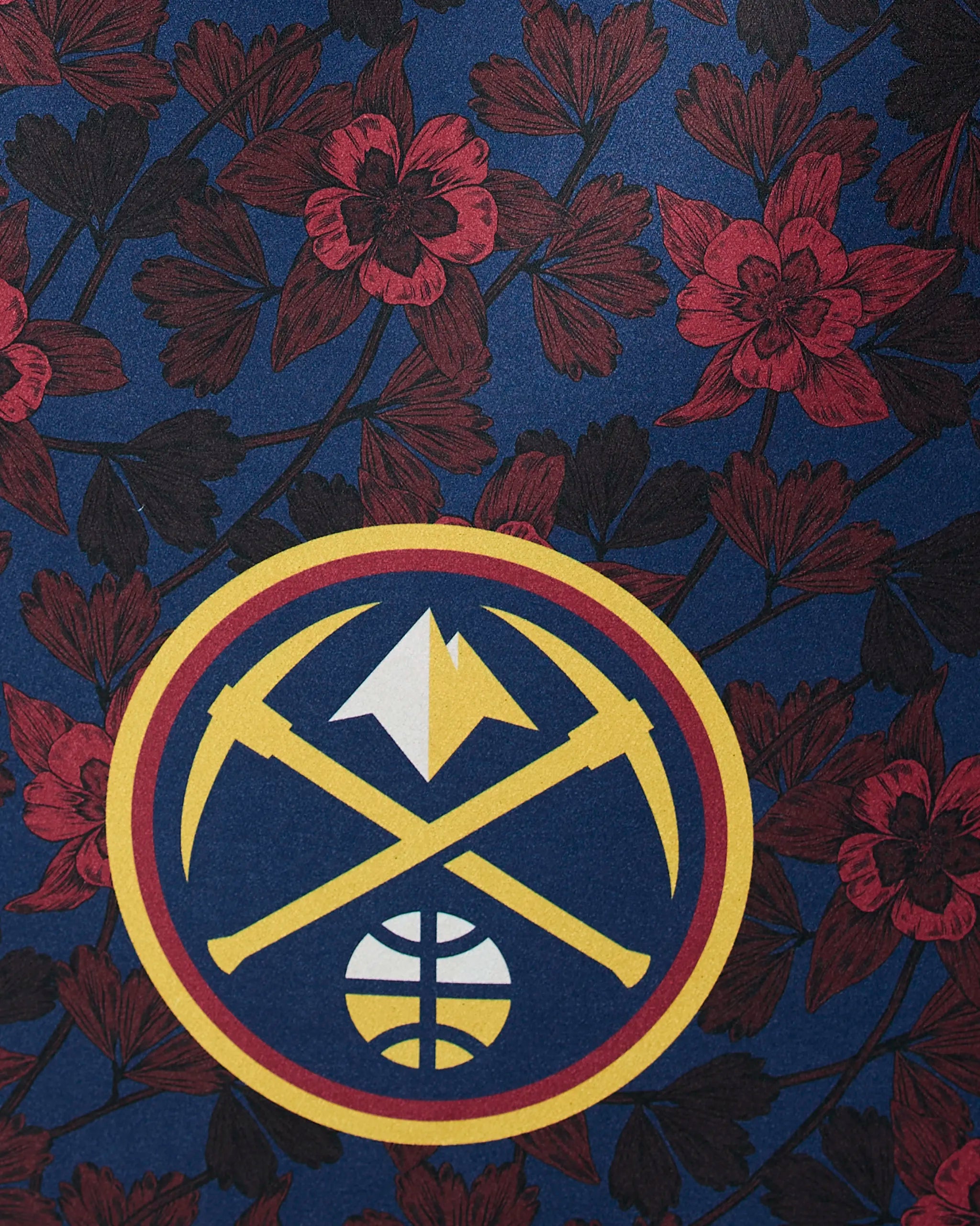 The Geometry Nuggets Floral design showcases the Denver Nuggets logo—with yellow pickaxes, a basketball, and mountain—centered on dark blue with a red floral pattern.