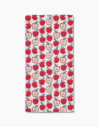 Apple A Day by Hufton Studio is a rectangular white bar towel with red whole and sliced apples and blue leaves, evenly spaced. Made from Geoweave fabric for superior softness and durability.