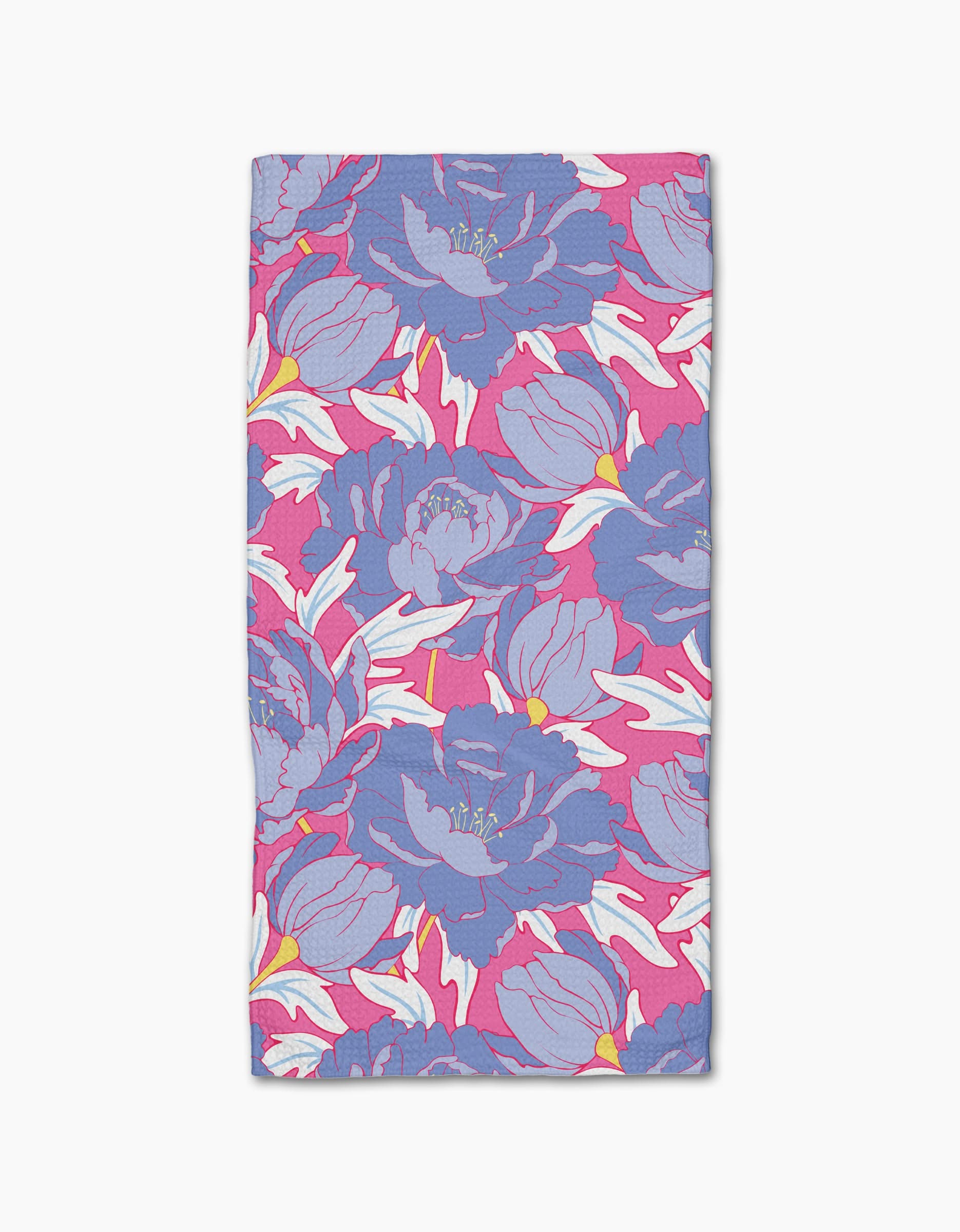 The Ashley Celena Blooming Peonies Bar Towel boasts a vibrant floral print with purple and pink flowers on a pink background, made from premium Geoweave fabric for excellent absorbency.