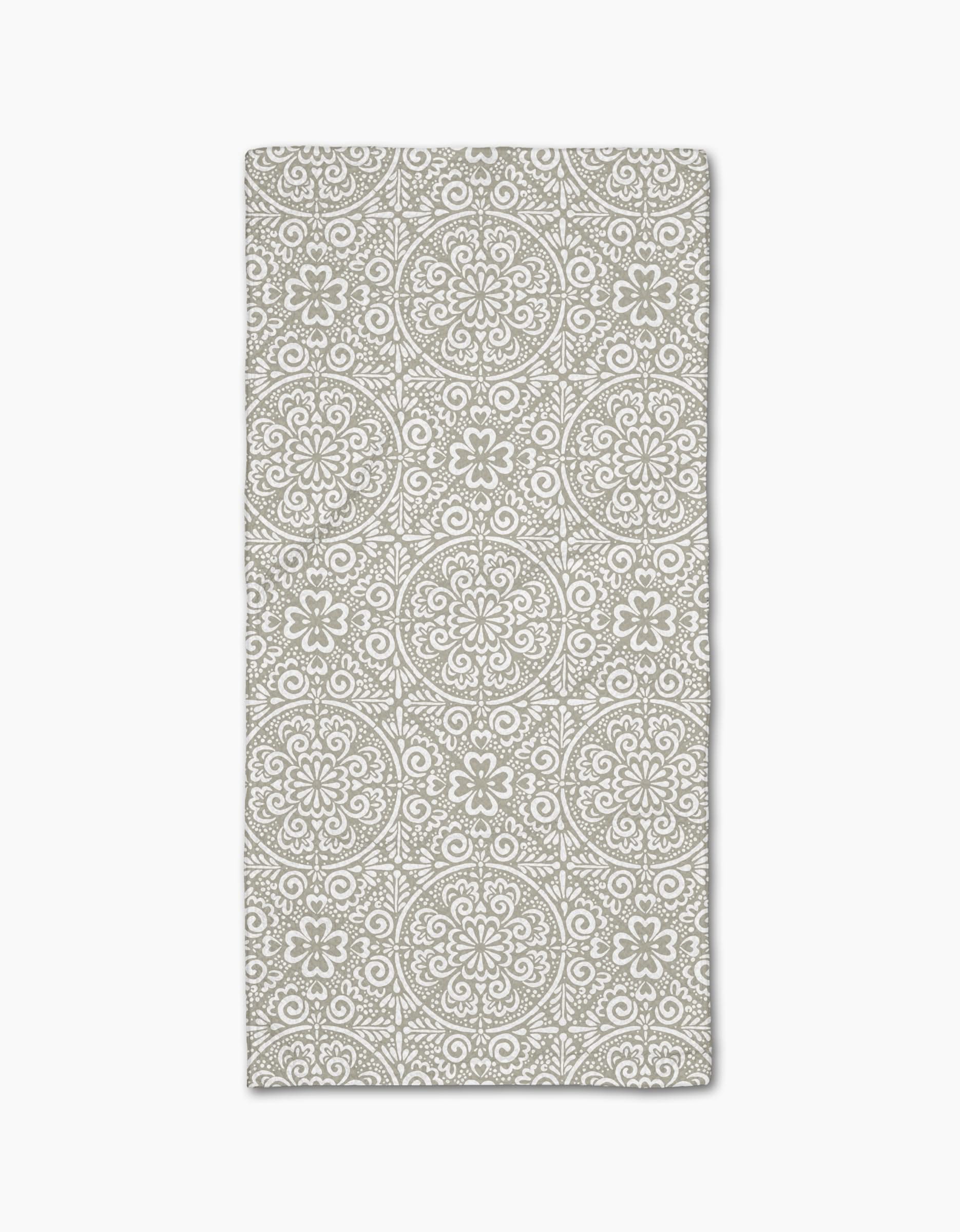 The Kris Ruff Boho Medallion bar towel features a beige rectangular design with symmetrical white floral and circular mandala patterns, crafted from durable Geoweave fabric on a plain white background.