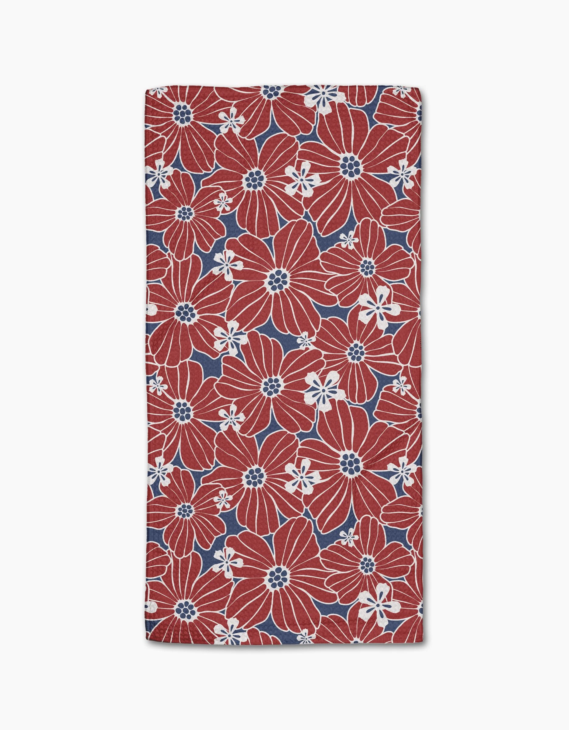The Botanical Blush napkin by Ashley Celena is a rectangular Geoweave fabric with a red background, adorned with large red and small white flowers plus blue accents.