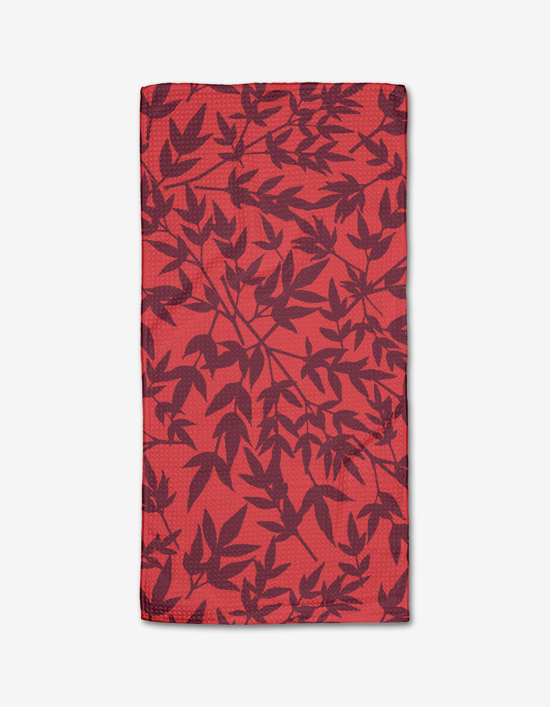 The Rebecca Bobko Burgundy Branches is a rectangular red cloth napkin made from ultra-absorbent Geoweave fabric, featuring a dark red botanical leaf pattern, shown flat on a white background.