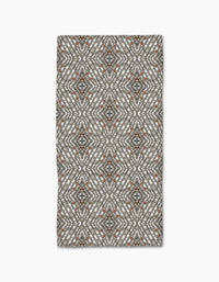 The Katherine Berkeley Cha Cha Interchange is a rectangular bar towel with a geometric diamond and dot pattern in gray, black, and brown Geoweave fabric, shown flat on a white background.