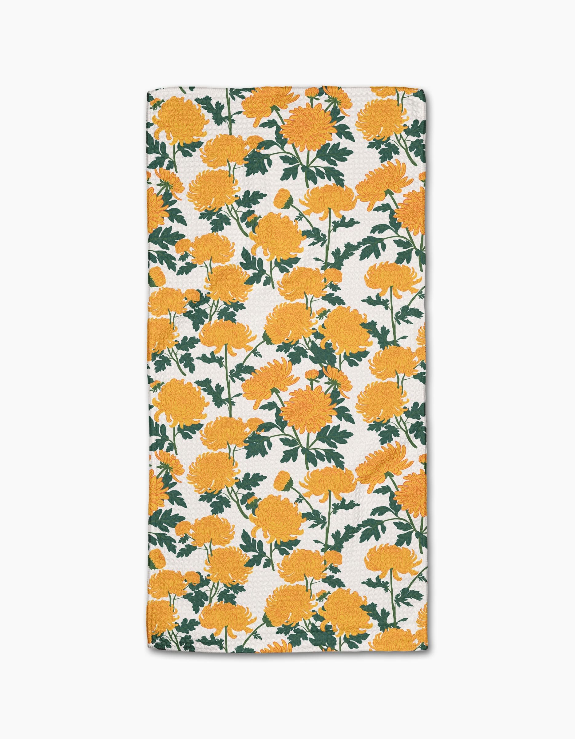The Chrysanthemum bar towel by Vaishali Design Studio features a rectangular white design with bright yellow chrysanthemum flowers and green leaves, crafted from soft Geoweave fabric for superior absorbency and durability.