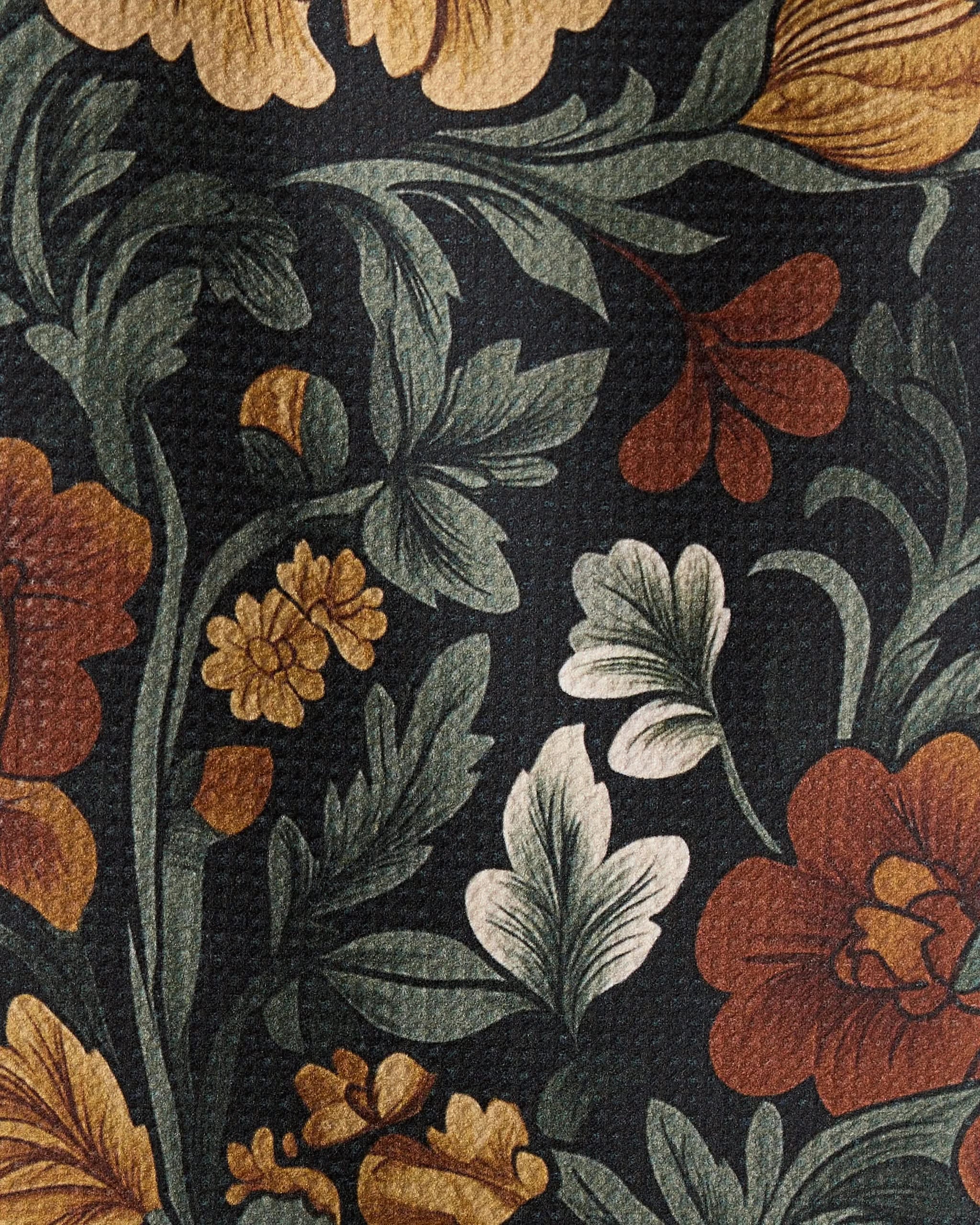 Classic Foliage by Geometry features a vintage botanical pattern of orange, gold, and white flowers with green leaves on black. This ultra-absorbent towel blends intricate blossoms with practical elegance.