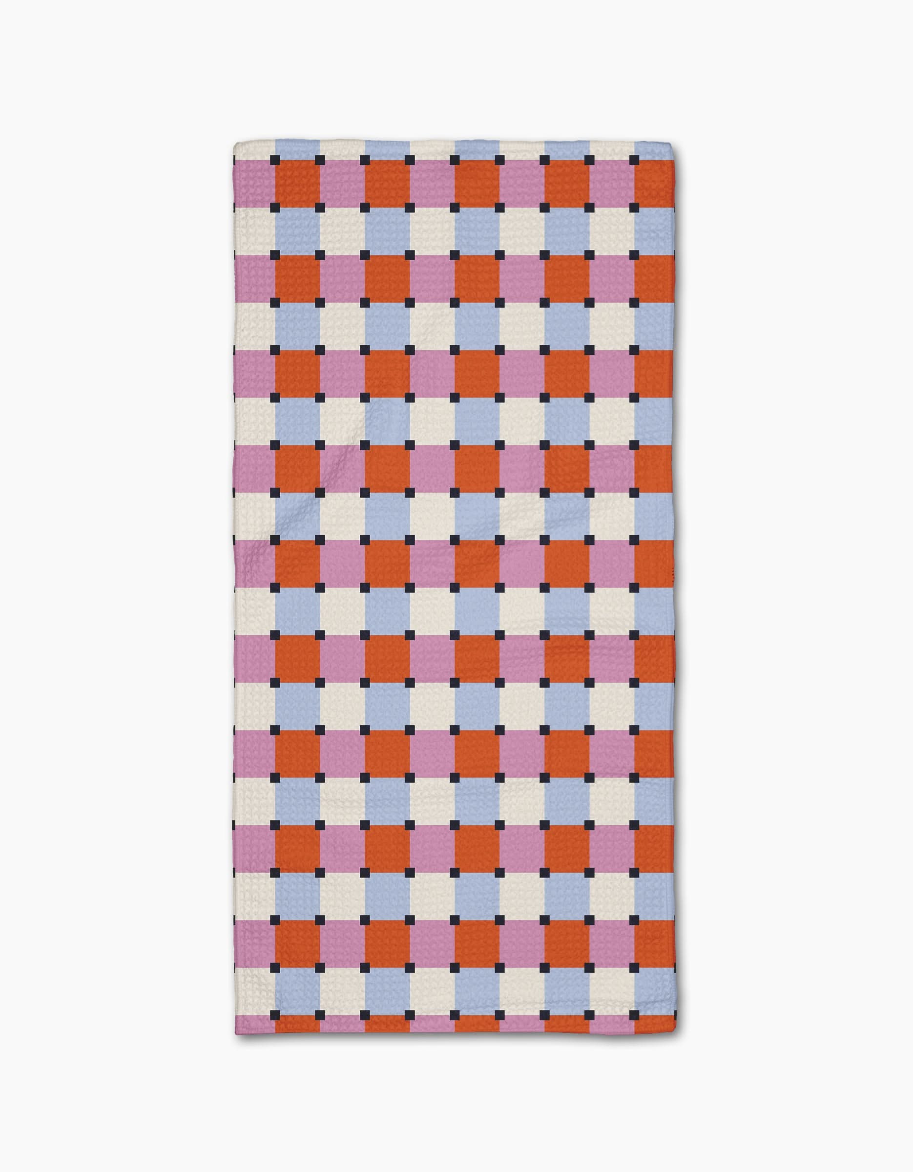 The Claire Iglesias Color Block Grid Bar Towel is crafted from Geoweave™ fabric and showcases an orange, pink, and white checkerboard pattern with blue and black accents on a crisp white background.