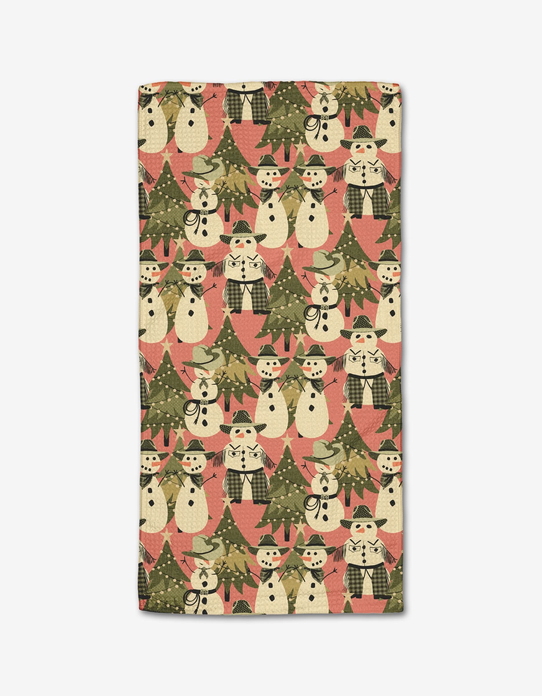 Julianne Hanesss Cowboy Snowmen bar towel features snowmen in hats and scarves, Christmas trees, and red semi-circles on beige Geoweave fabric for superior absorbency—perfect for festive holiday decor.