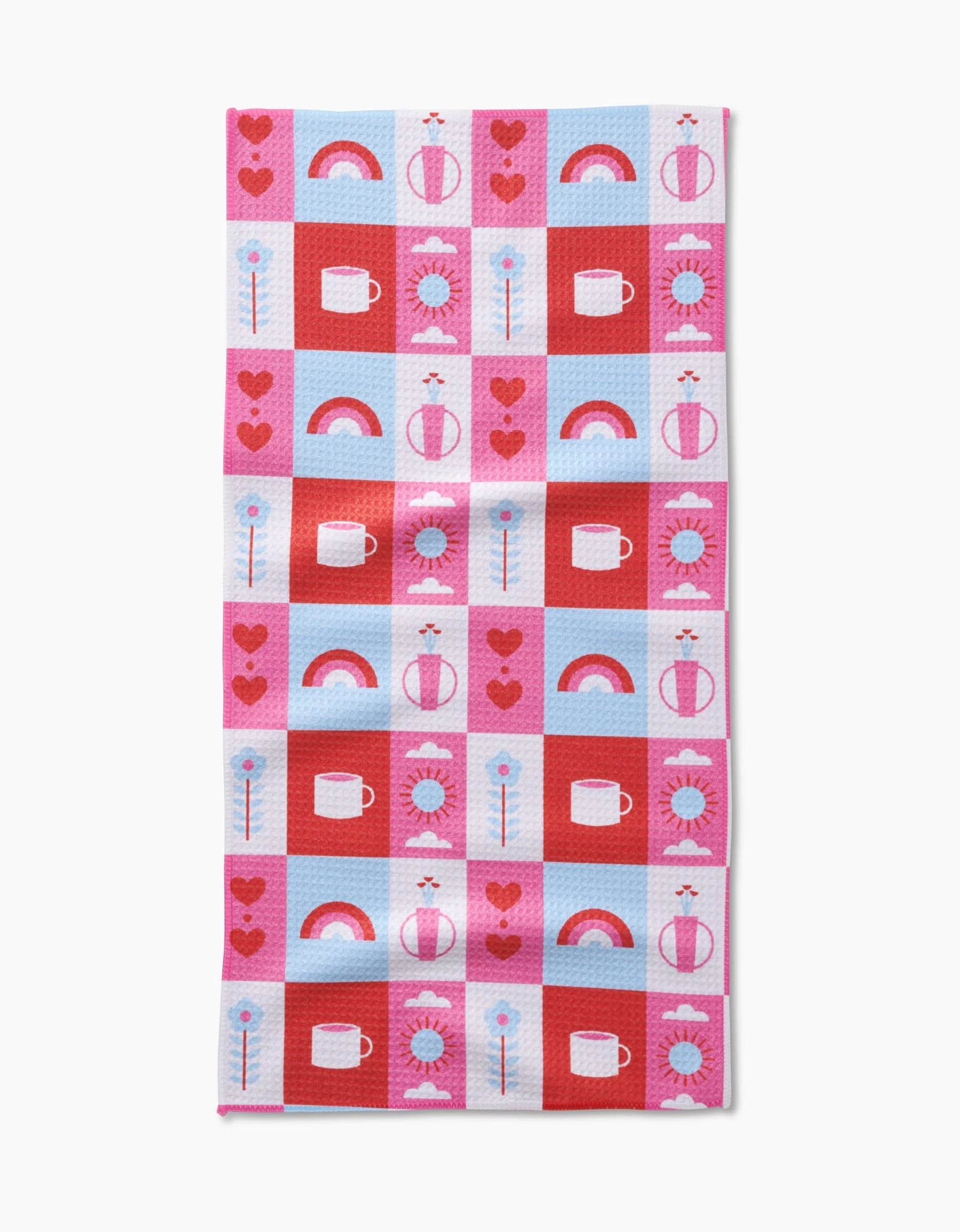 The Daily Icons Bar Towel by Laura Supnik showcases a pink, red, white, and light blue checkerboard with hearts, rainbows, mugs, flowers, and suns—crafted from recycled materials for an eco-friendly touch.