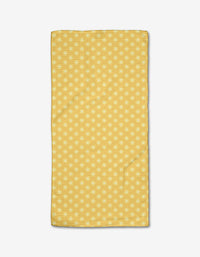 The Rebecca Bobko Daisy Daze bar towel features a yellow background with small white flowers, crafted from ultra-absorbent Geoweave fabric and displayed on a white surface.