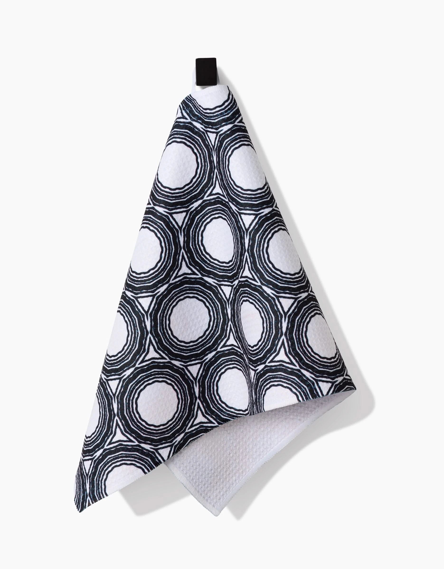 Dosido by Katherine Berkeley: a hanging Bar Towel with a black and white circular, hand-drawn pattern on ultra-absorbent Geoweave fabric and a black top loop, shown against a plain white background.