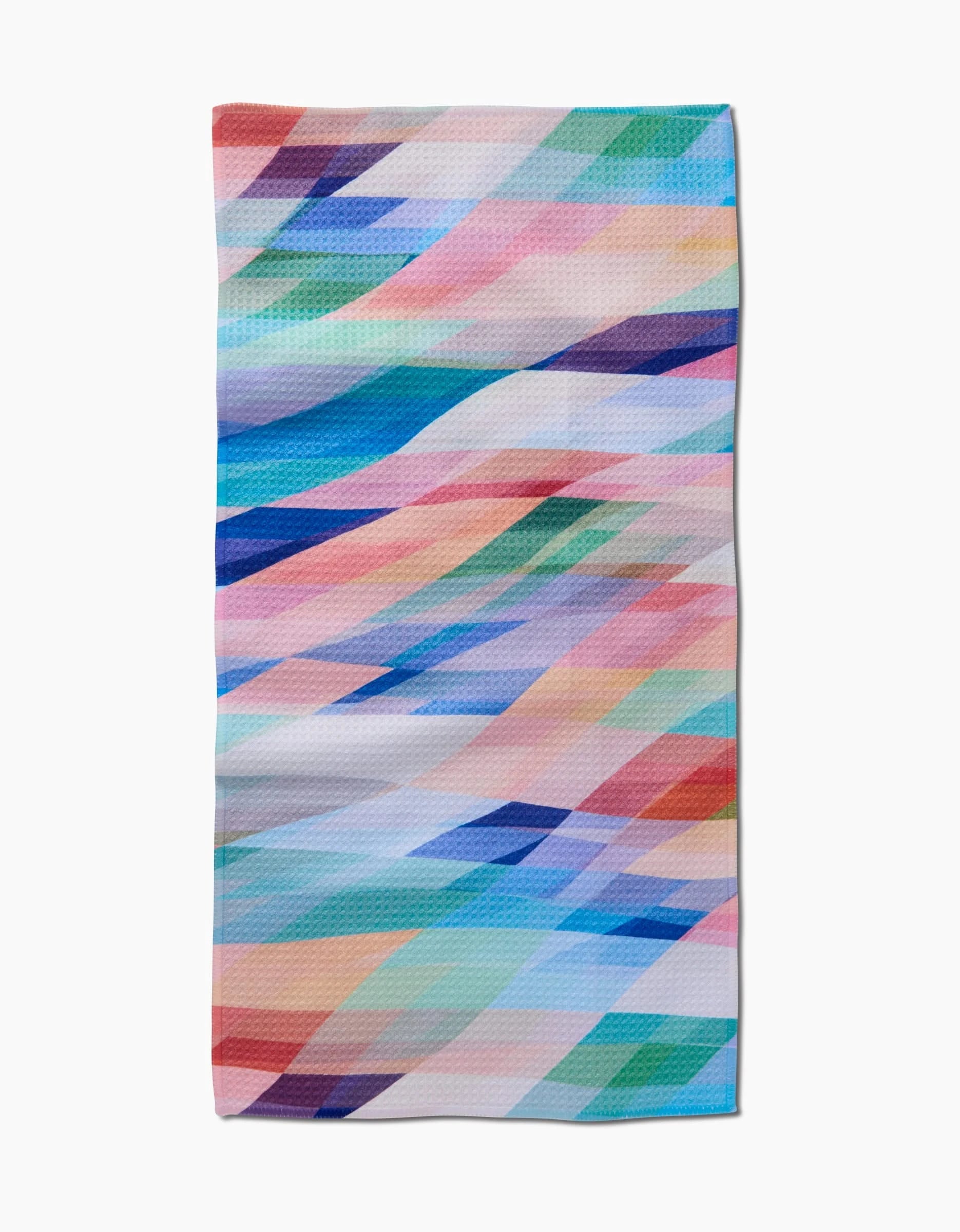 The Rachel Parker Eventide rectangular Bar Towel displays a vibrant abstract geometric pattern of overlapping blue, pink, purple, green, and orange shapes on white Geoweave fabric.