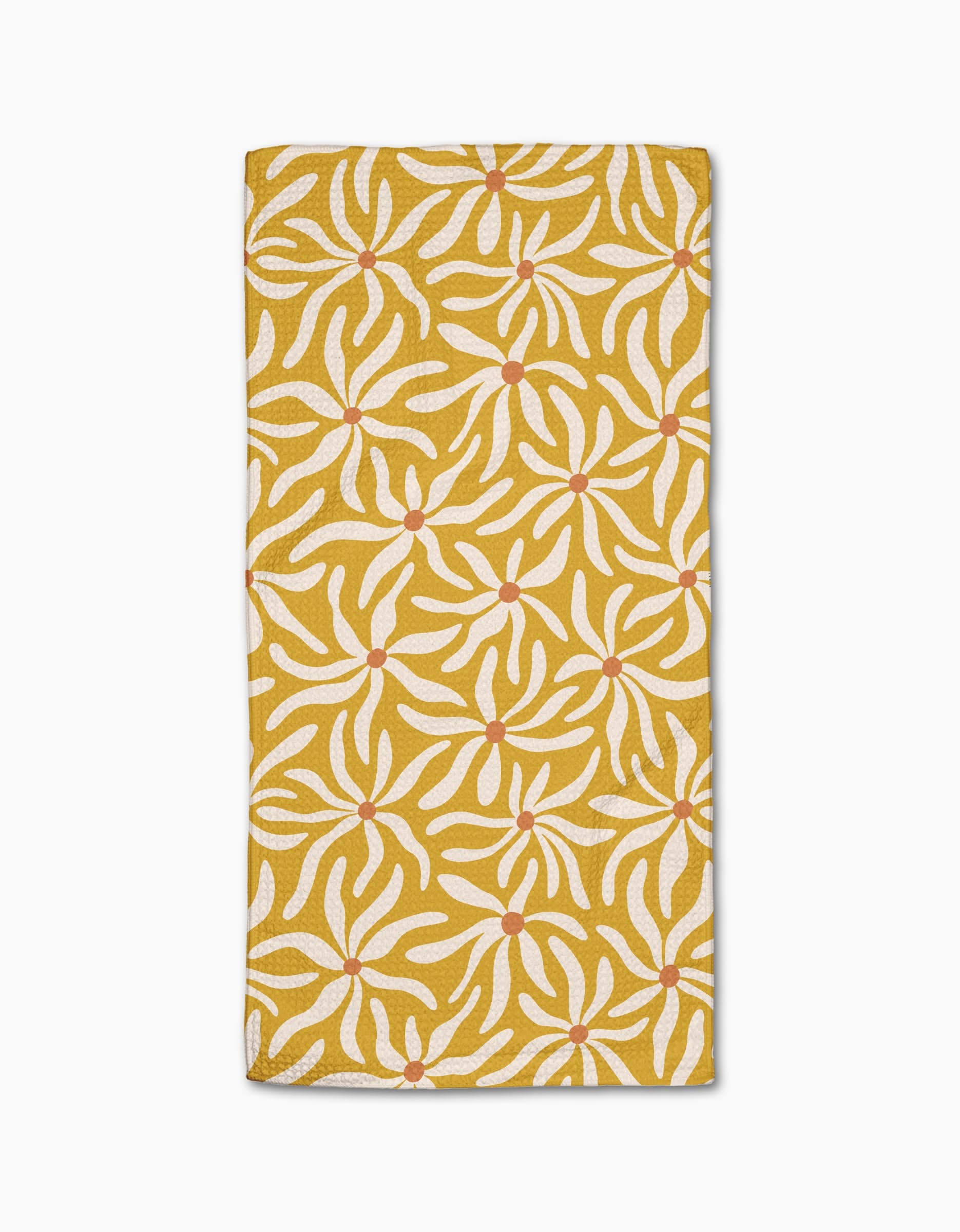 The Gerdadzy Floral Spell is a folded yellow napkin made from recycled towel material, decorated with a white floral pattern and red dots in each flowers center, set against a white background.