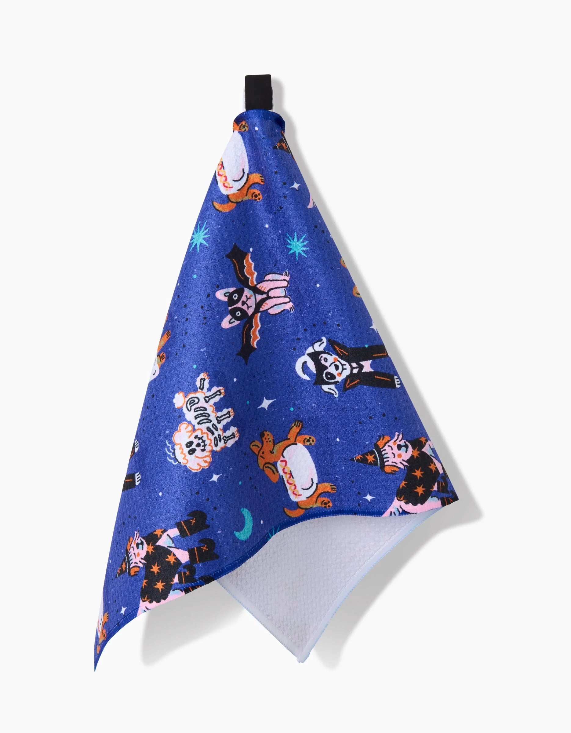 The Halloween Hounds Bar Towel by Camila Leão features colorful cartoon dogs and celestial patterns, including stars and moons, on blue Geoweave™ fabric for excellent absorbency and quick drying. A black loop allows for easy hanging.