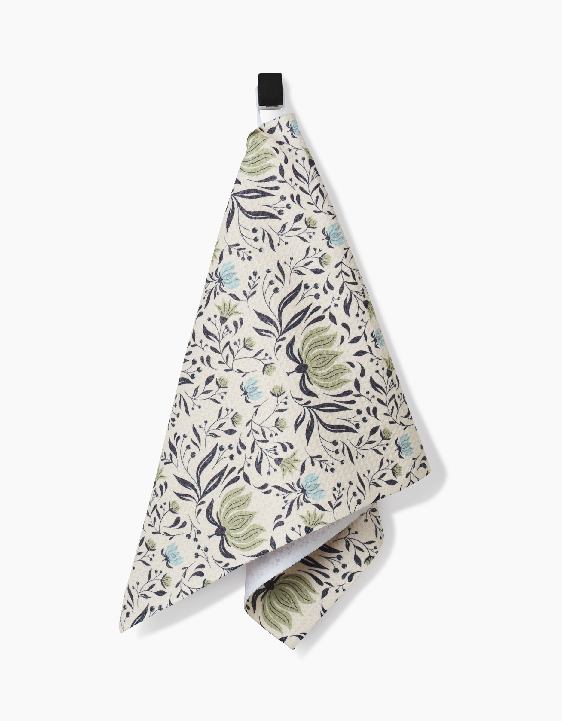 The Hello Flowers hanging kitchen bar towel by Amita Nair features a floral pattern in green, blue, and black on white. Made from ultra-absorbent Geoweave fabric, it’s pictured against a plain white background.