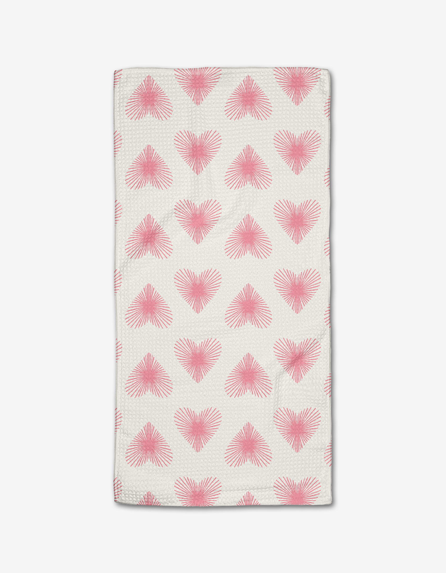 The Life Line Hearts bar towel by Hufton Studio is a white rectangular towel with neat rows of pink heart shapes, made from soft Geoweave fabric.