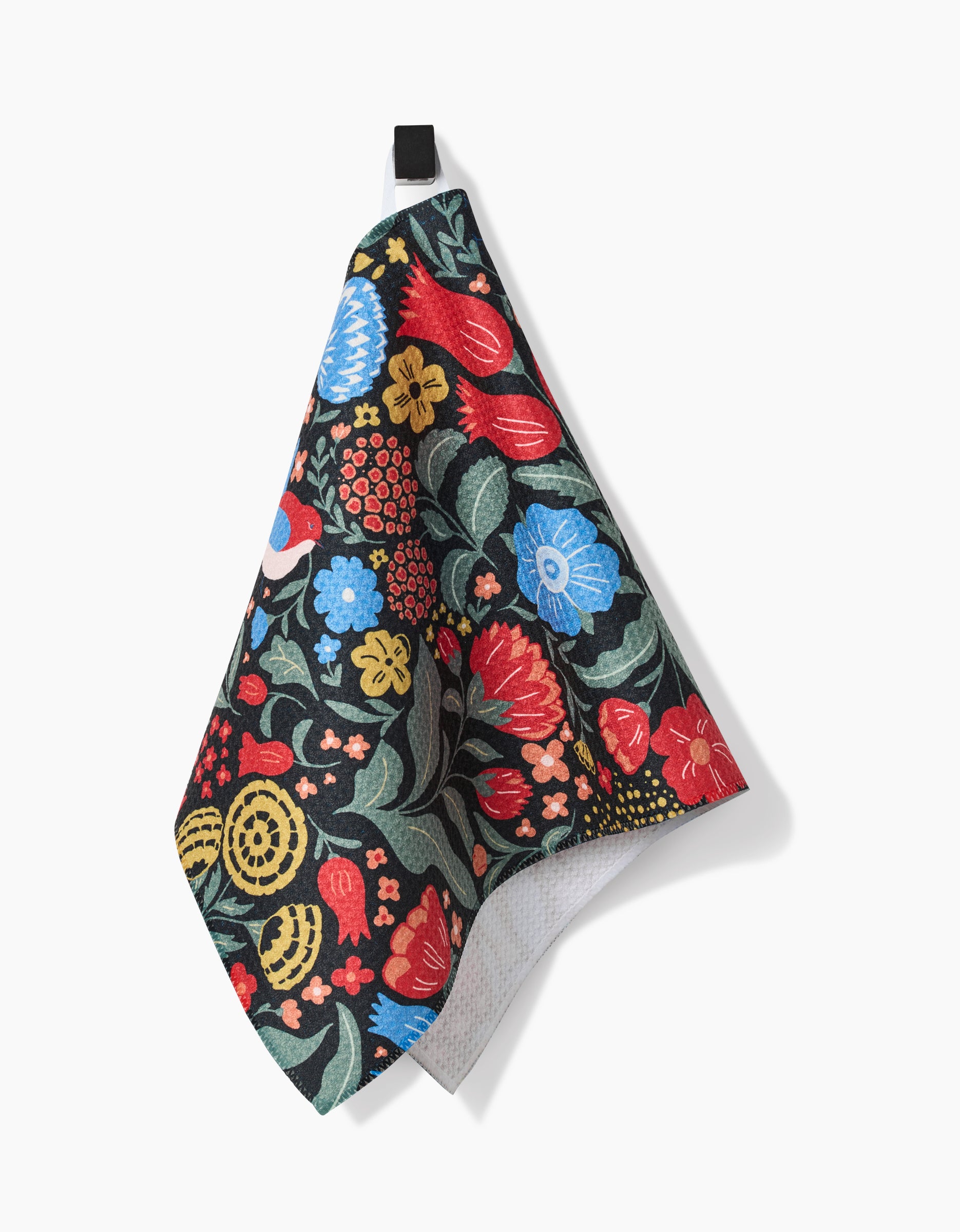The Marsh Wren bar towel by Danelys Sidron hangs from a black loop, showcasing a vibrant floral pattern on a dark background. Made with ultra-absorbent Geoweave fabric for superior drying.