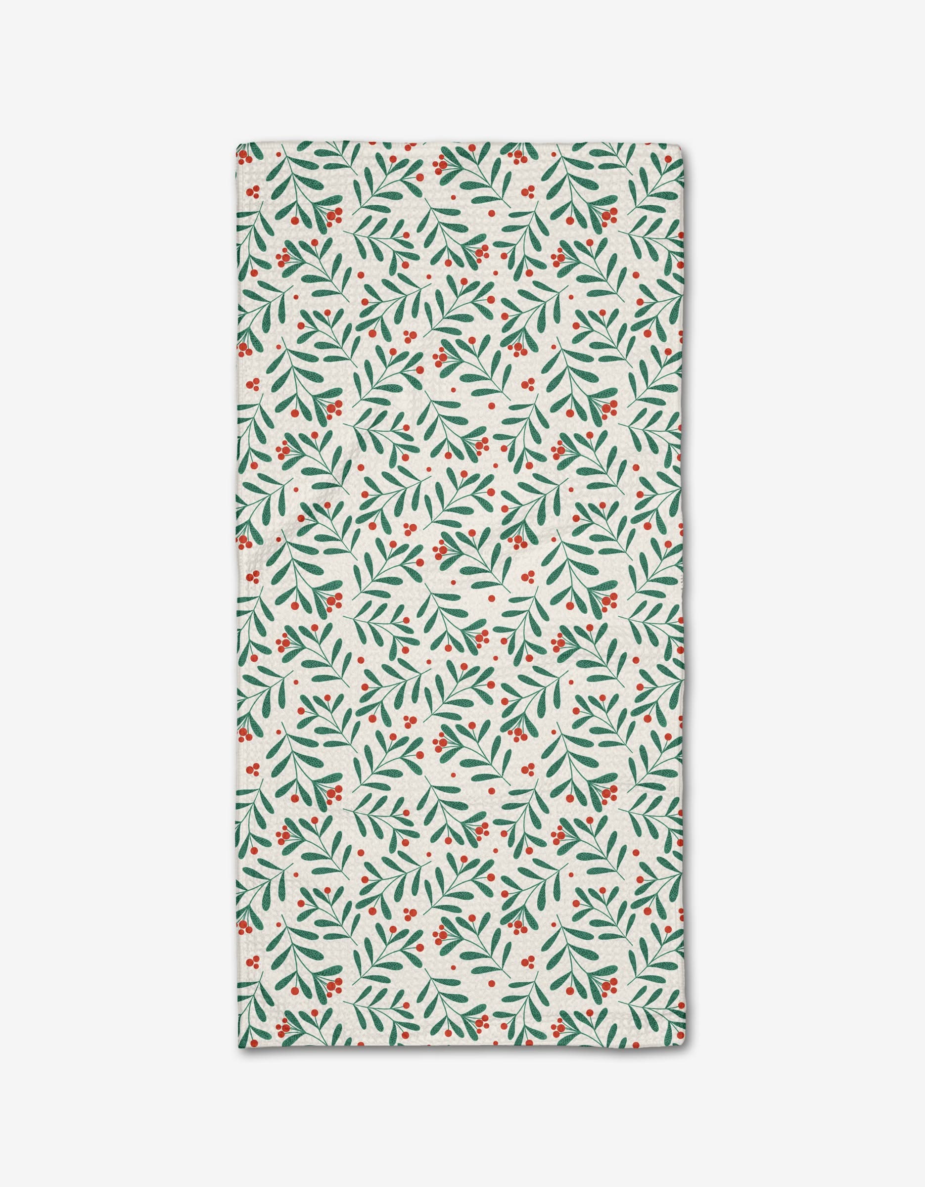 The Merry Berry Cherry Red napkin by Charlie Rowan Designs is a rectangular white cloth featuring green leaves and red berries, made from recycled materials and shown flat on a white background.