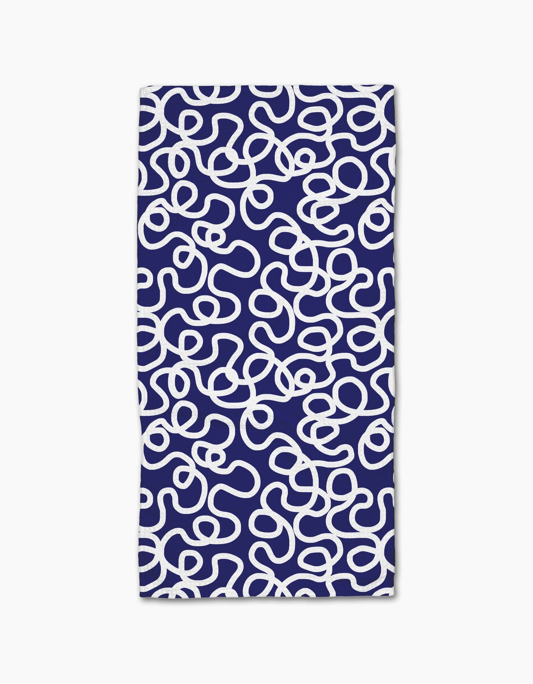 The Rachel Parker Mini Wander is a rectangular bar towel with a dark blue background and abstract white squiggle pattern, made from durable Geoweave fabric using post-consumer recycled materials.