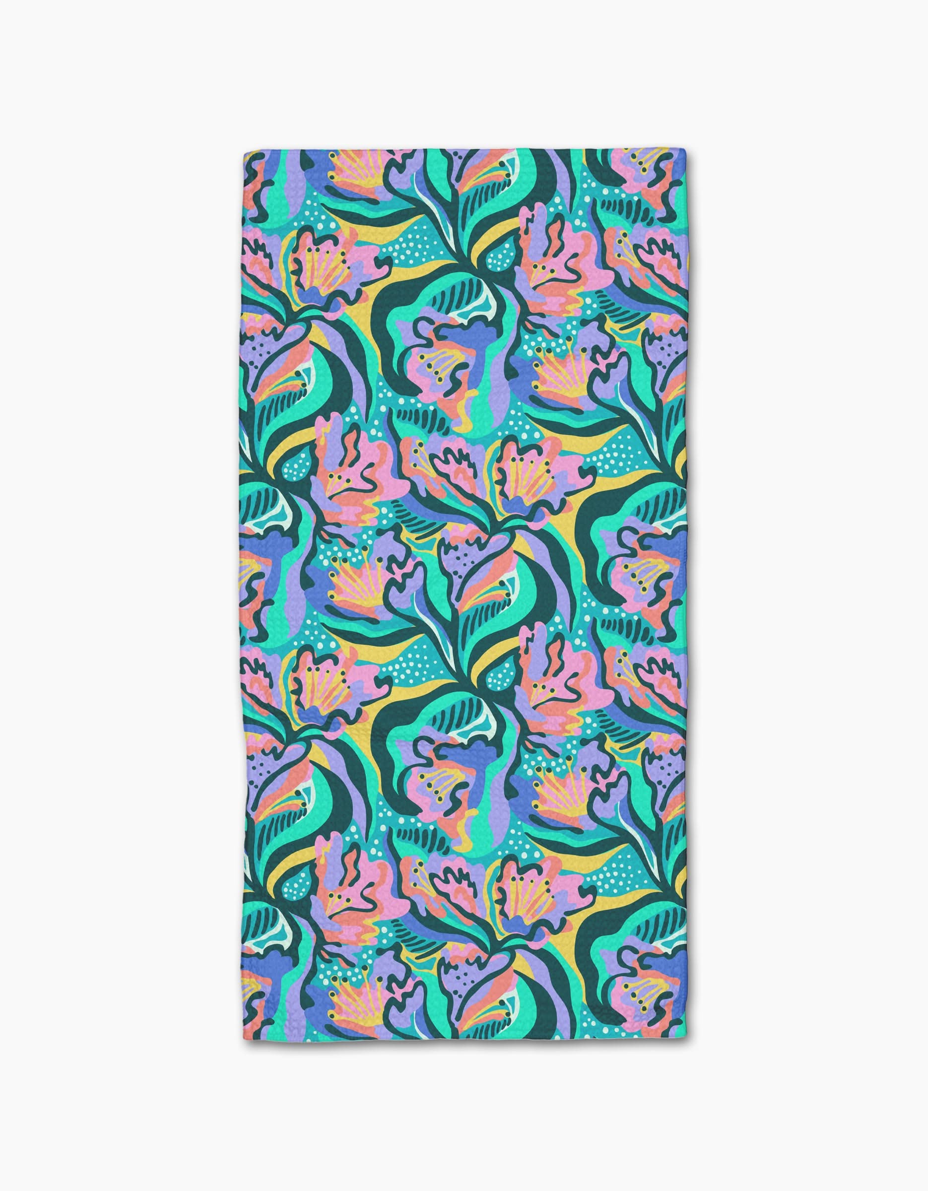 The Moody Flowers Bar Towel by Masha Volnova is rectangular, made from recycled materials, and features a colorful abstract floral pattern in pink, green, blue, yellow, and purple on a teal background.