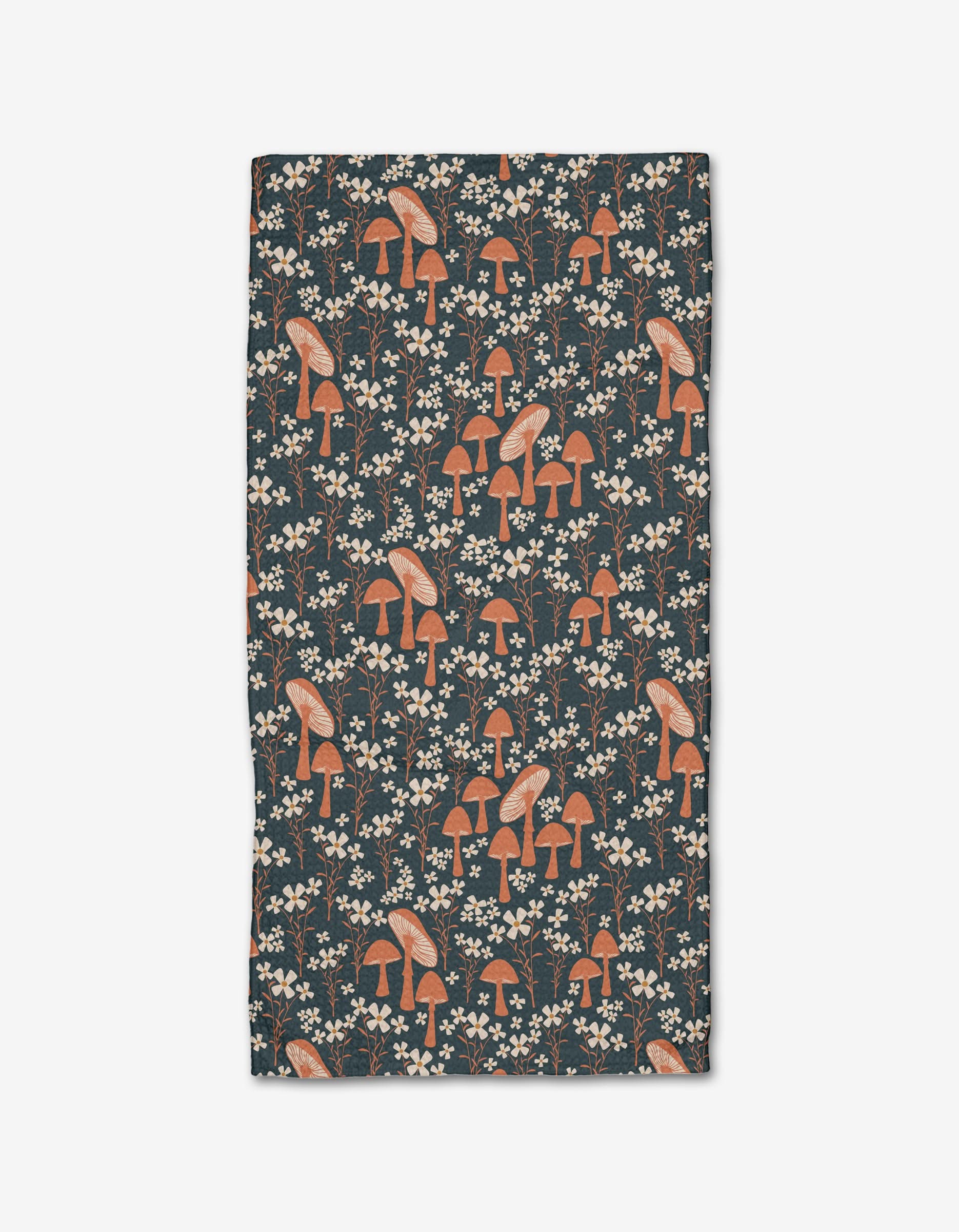 Mushroom Grove by Charlie Rowan Designs is a rectangular bar towel with orange and white mushrooms and small white flowers on a dark background, made from Geoweave™ fabric for excellent absorbency and durability.