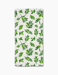 The Olive Grove towel by Geometry features ultra-absorbent white fabric with a stylish repeating green olive branch pattern—perfect as a chic bar towel for your kitchen.