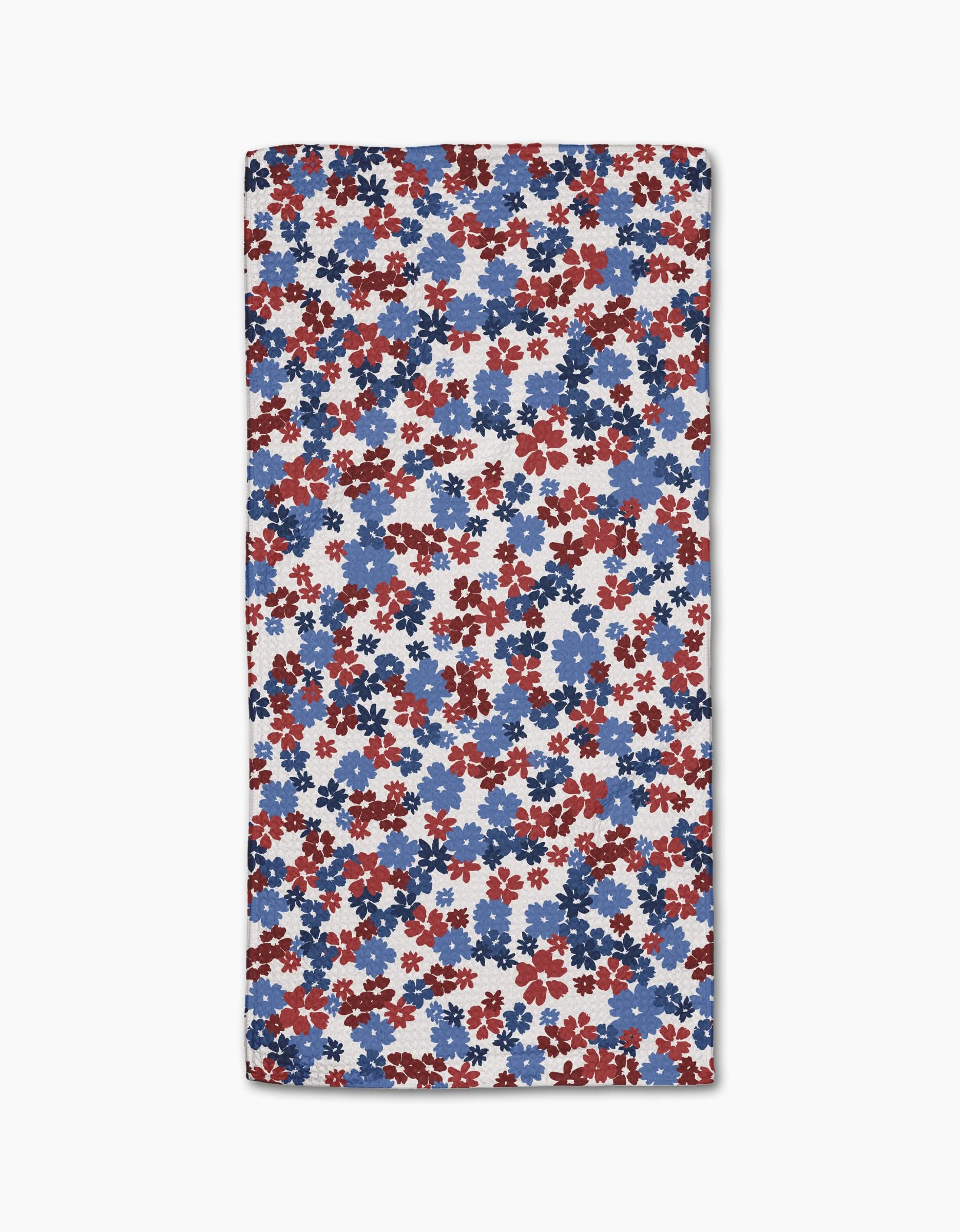 The Painted Petals Bar Towel by Ashley Celena features small, overlapping red, blue, and navy floral shapes on white Geoweave fabric for ultra-absorbency.