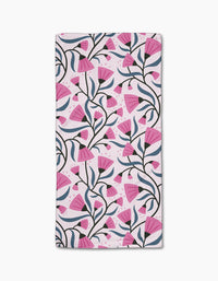 The Petal Symphony Bar Towel by Anette Heiberg features a repeating pink flower pattern with dark green stems on white, crafted from Geoweave fabric for superior absorbency.