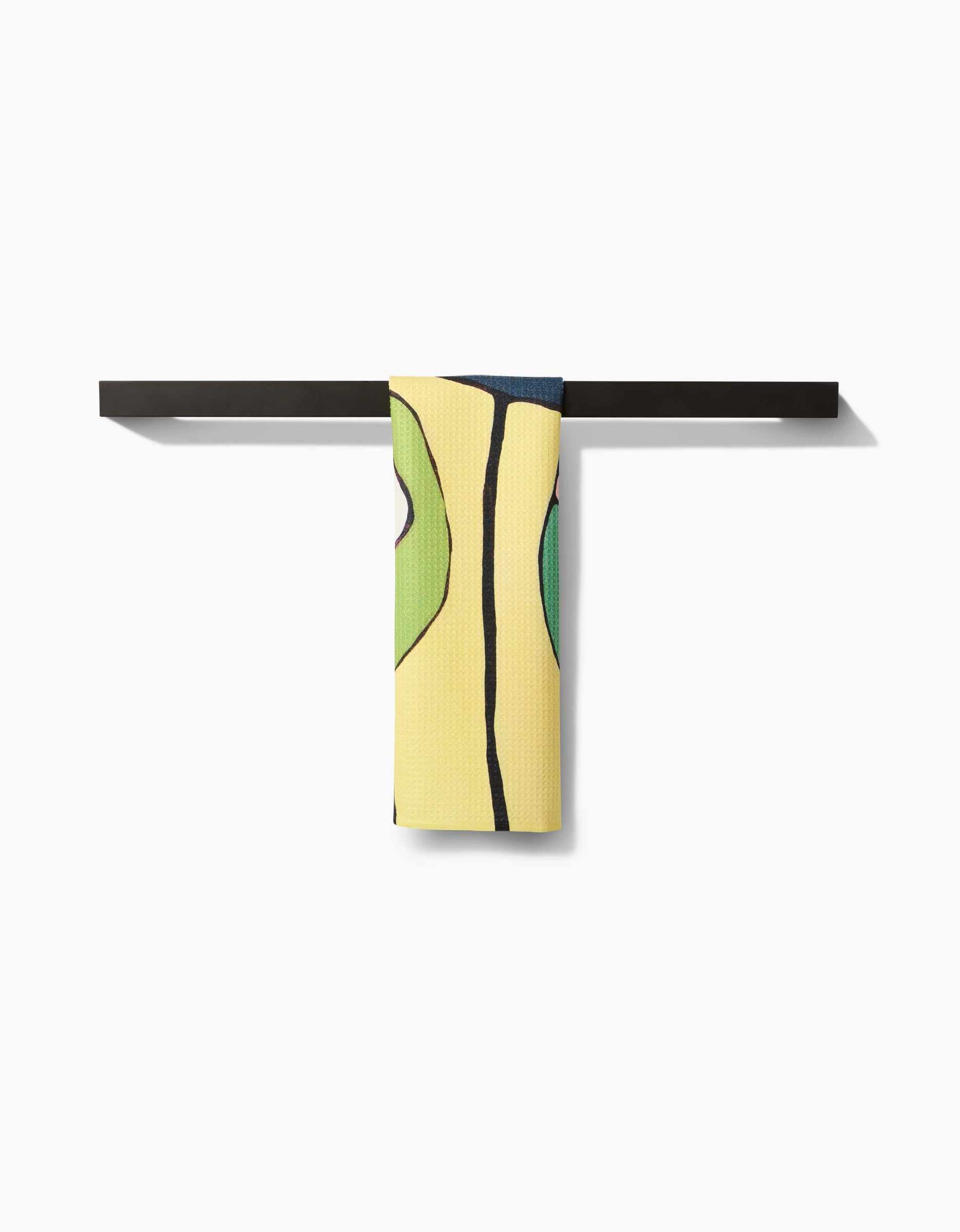 The Poppies on Yellow Bar Towel by Rachel Austin, made from Geoweave fabric, is shown neatly folded over a modern black towel bar, set against a plain white background.