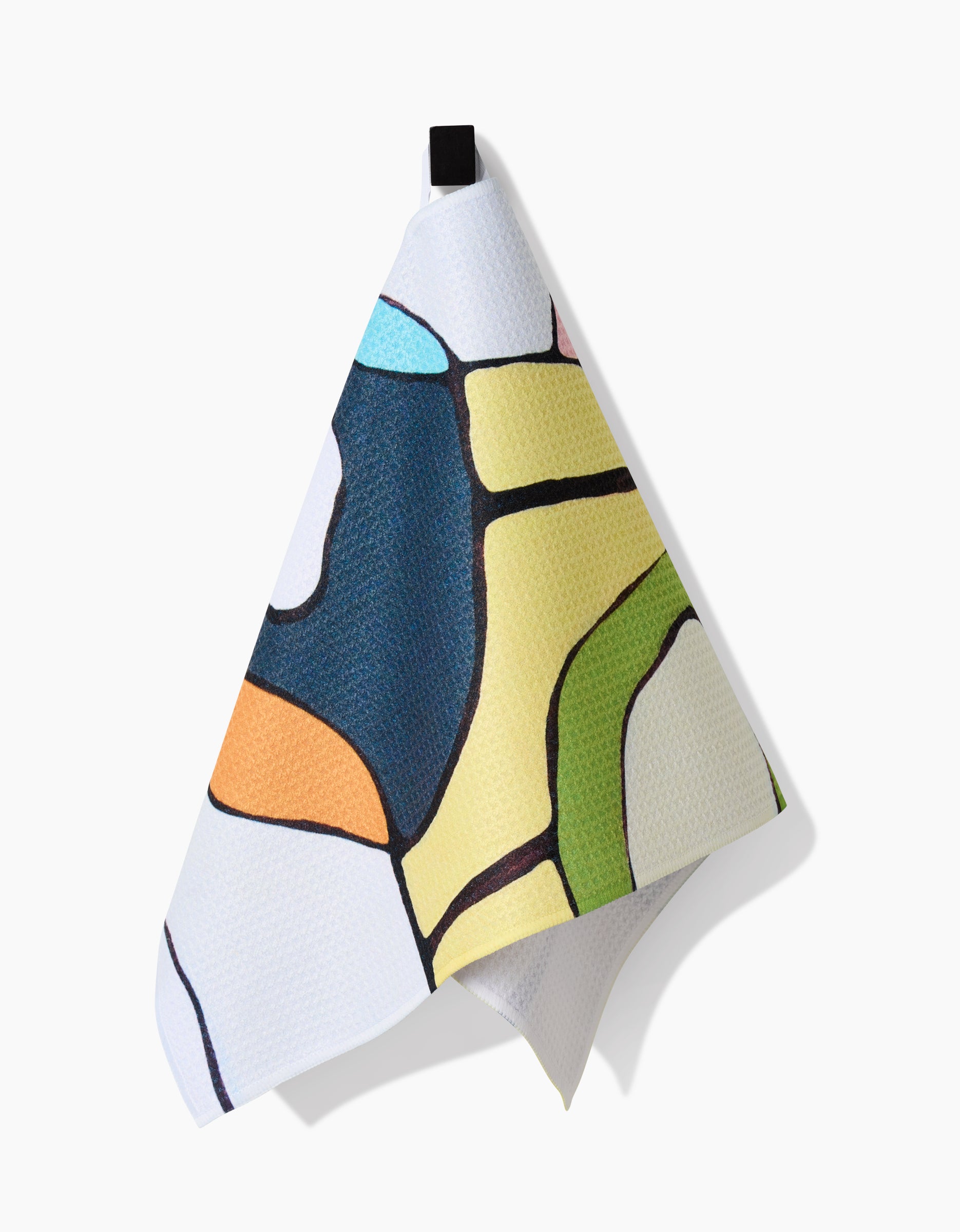 The Poppies on Yellow bar towel by Rachel Austin, made from recycled materials, displays vibrant abstract shapes and hangs from a black loop against a clean white background.