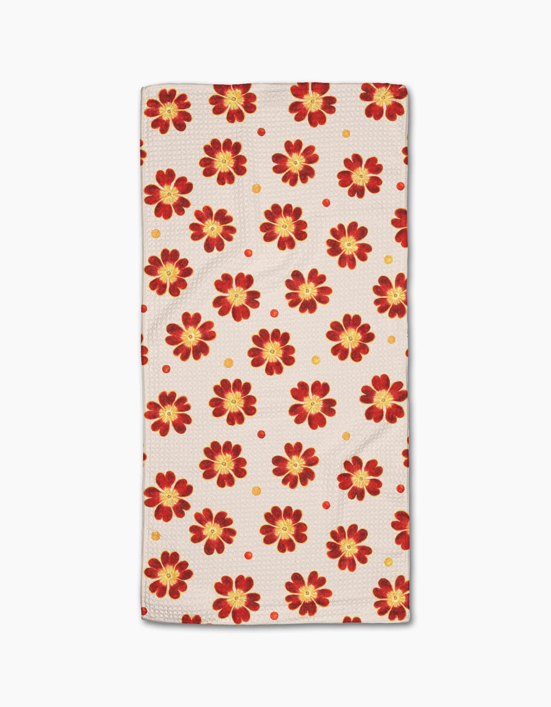 Spotty Floral by Linda Fox is a rectangular beige towel with ultra-absorbency, decorated with red and yellow floral patterns and scattered small red and yellow dots.