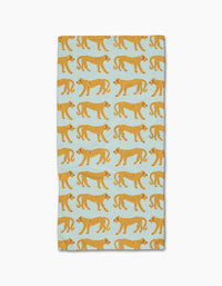 The Walking Cheetah bar towel by Jasmine Blooms Designs features a light blue rectangle with rows of orange, black-spotted cheetahs and is made from ultra-absorbent recycled materials for style and sustainability.
