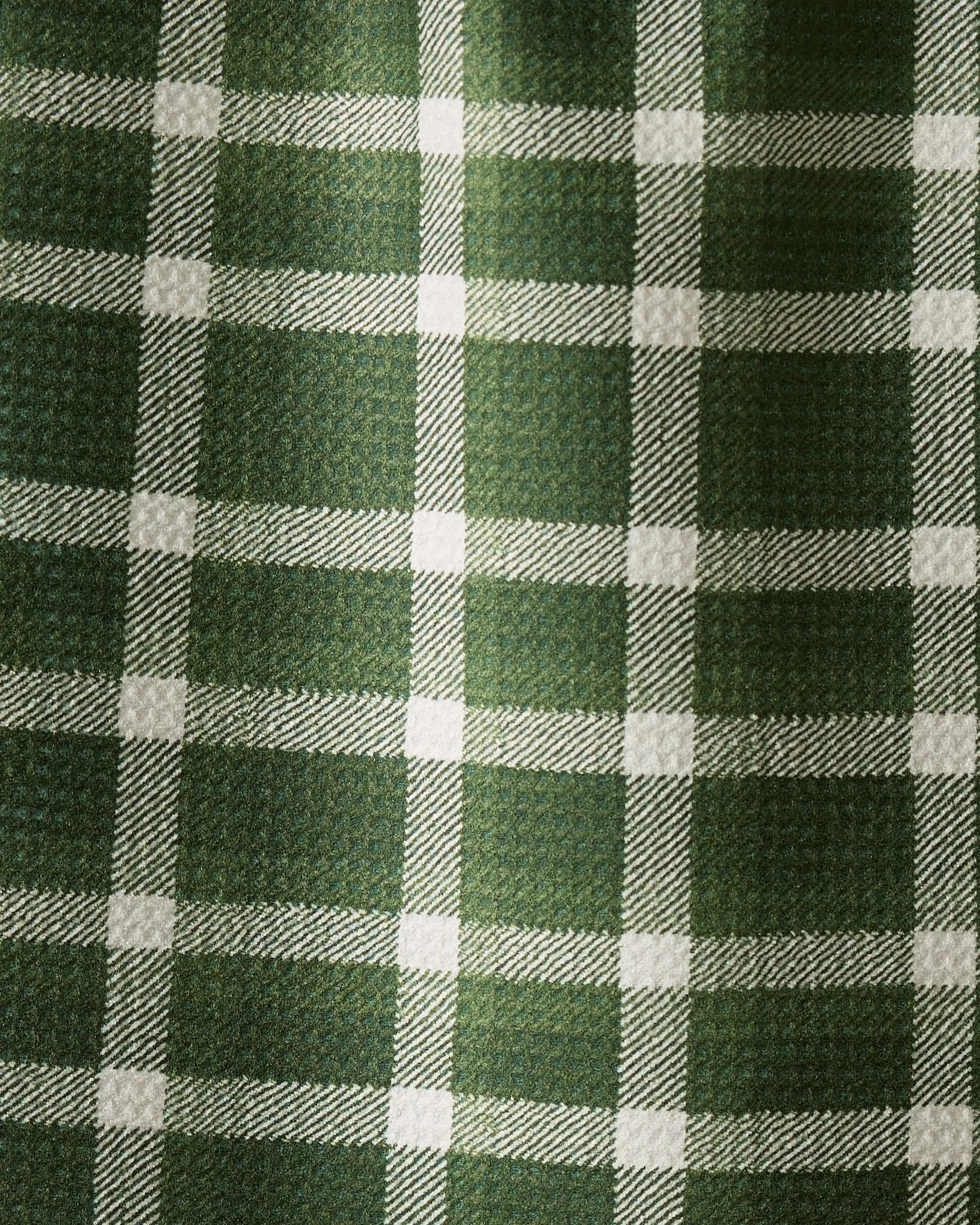 The Wicklow Green kitchen towel by Geometry features a green and white plaid with diagonal twill texture—ultra-absorbent and ideal for everyday use.