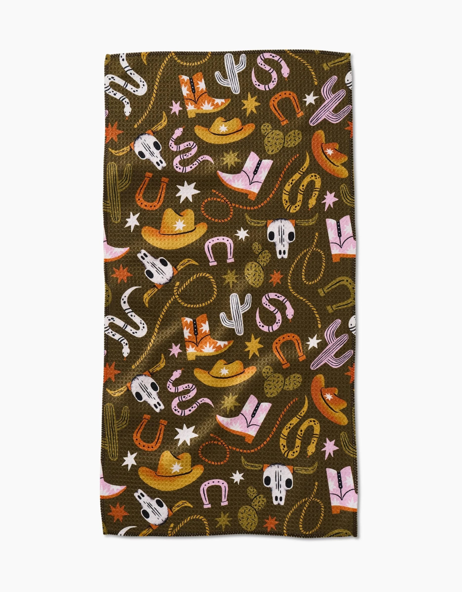 The Wild Cowboy bar towel by Megan Roy features a western pattern with cowboy hats, cacti, boots, and more in vibrant colors—crafted from recycled materials for an eco-friendly touch.