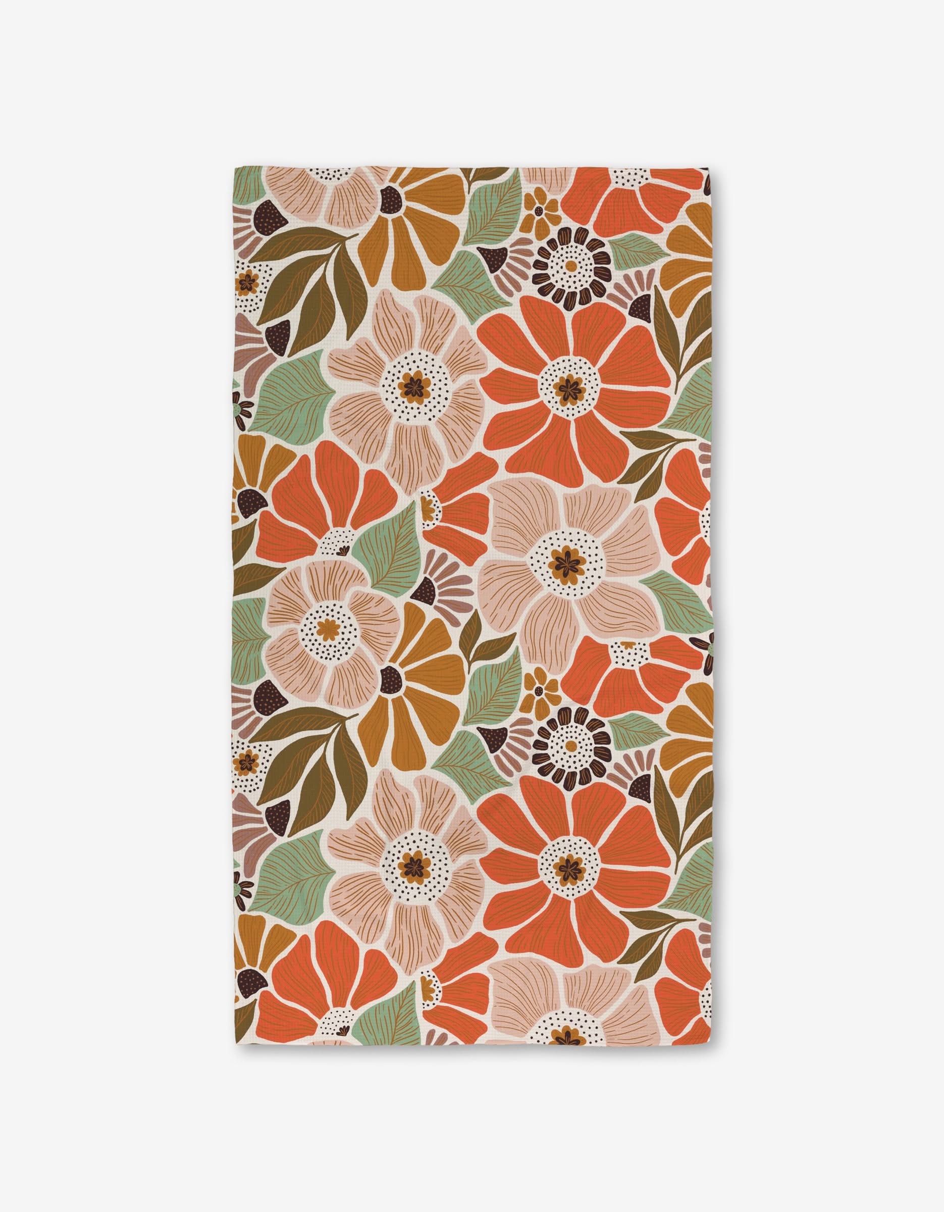 The Jorah Luxe Bath Towel by Amy MacCready features a colorful floral pattern in orange, beige, and brown with green leaves and white accents on white. Made with ultra-absorbent Geoweave technology for superior performance.