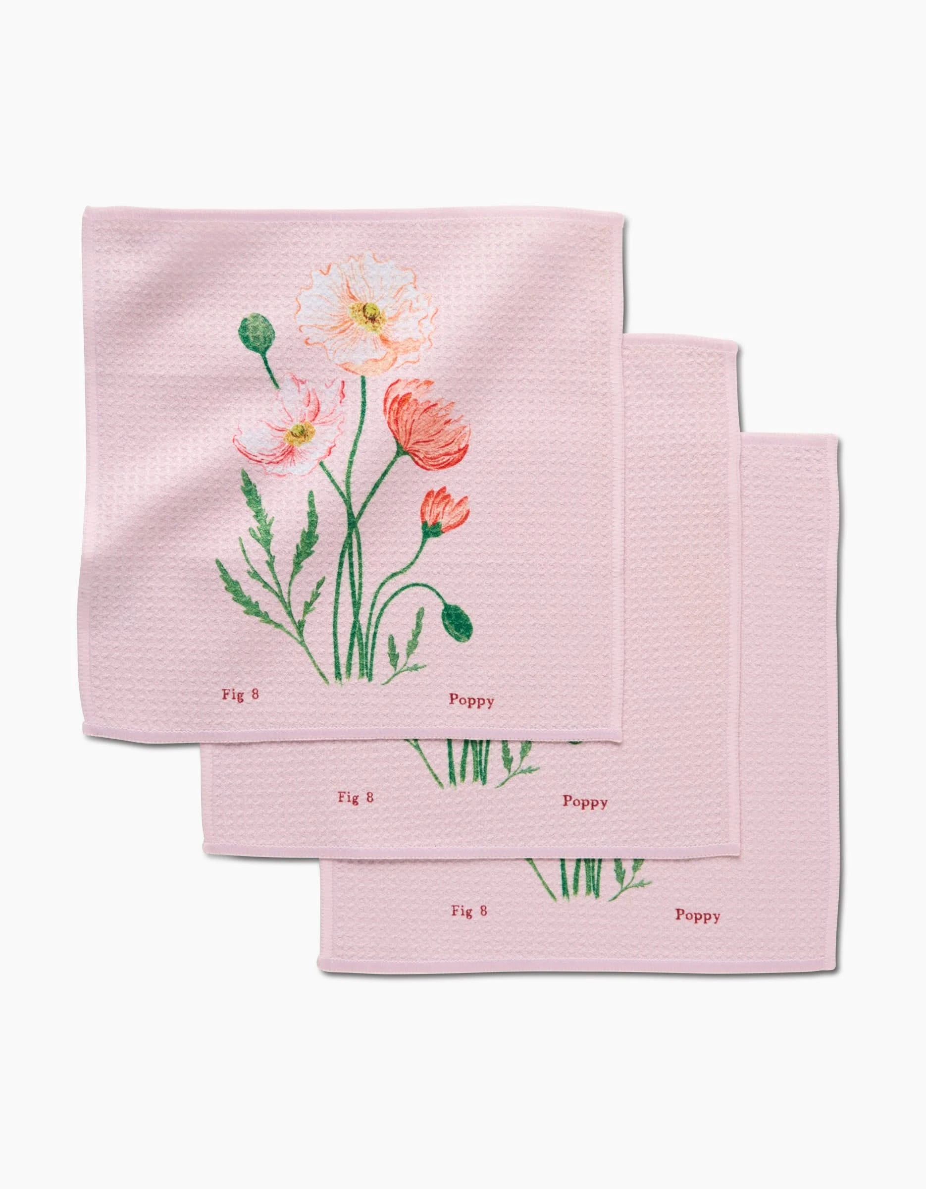 Set of three August Poppy cloth napkins by Linda Fox, made with Geoweave fabric. Each features a watercolor poppy flower with green stems, and Fig 8 and Poppy printed in the bottom right corner.