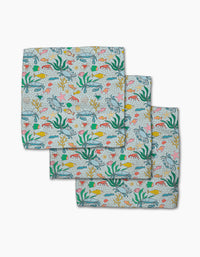 The Mindfulnice Beneath the Waves set includes three colorful napkins made from recycled materials, featuring fish, seaweed, coral, and starfish patterns on a light background.