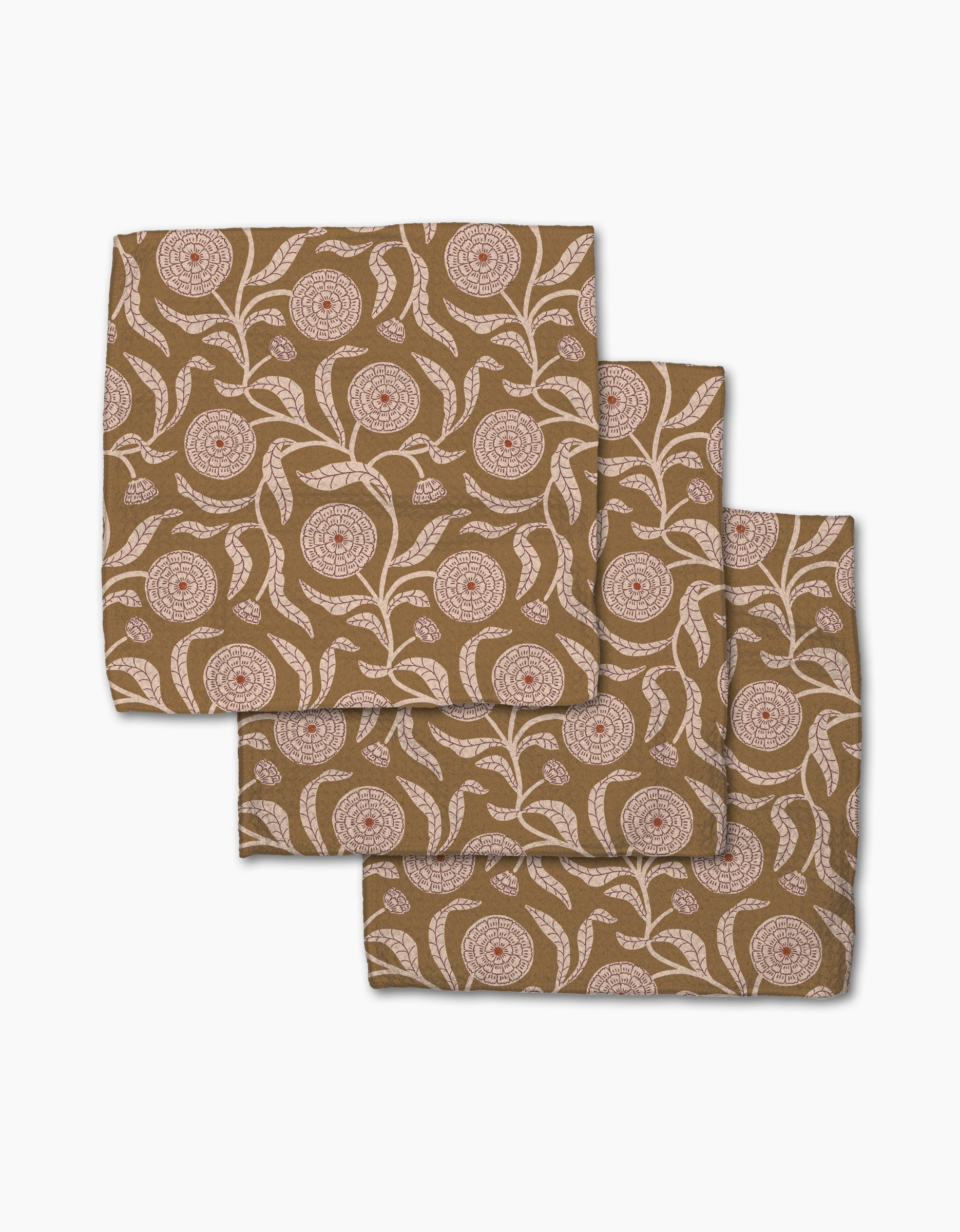Teri the Butter’s Falling Flowers napkins—three brown cloths with a white floral and leaf print—add charm to any set. Made from recycled materials, they’re an elegant, eco-friendly choice.