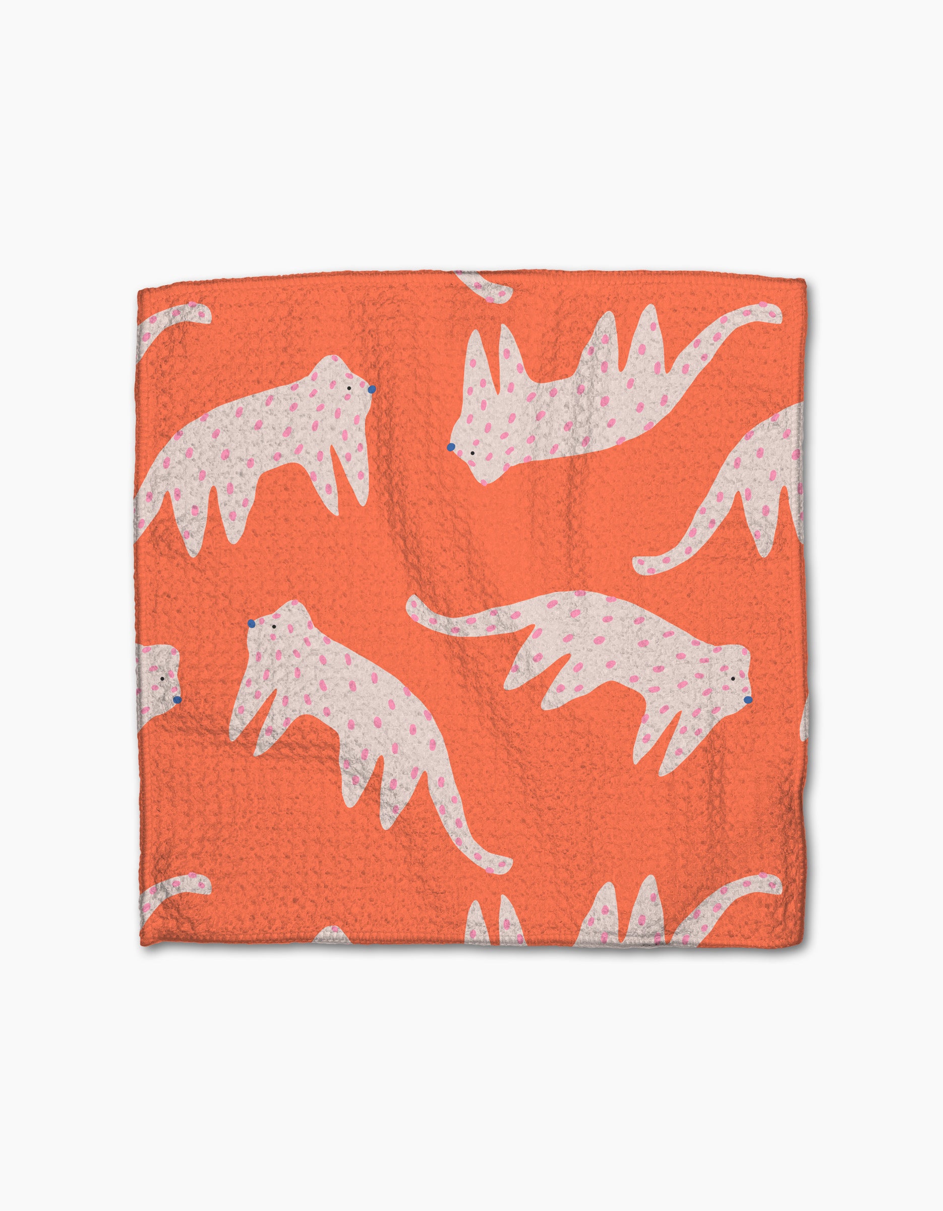 The Fluff and Feathers dishcloth by Jennifer Bouron is a rectangular orange Geoweave cloth with pale pink and white leopards featuring pink spots in various poses, adding charm and eco-friendly style to your kitchen.
