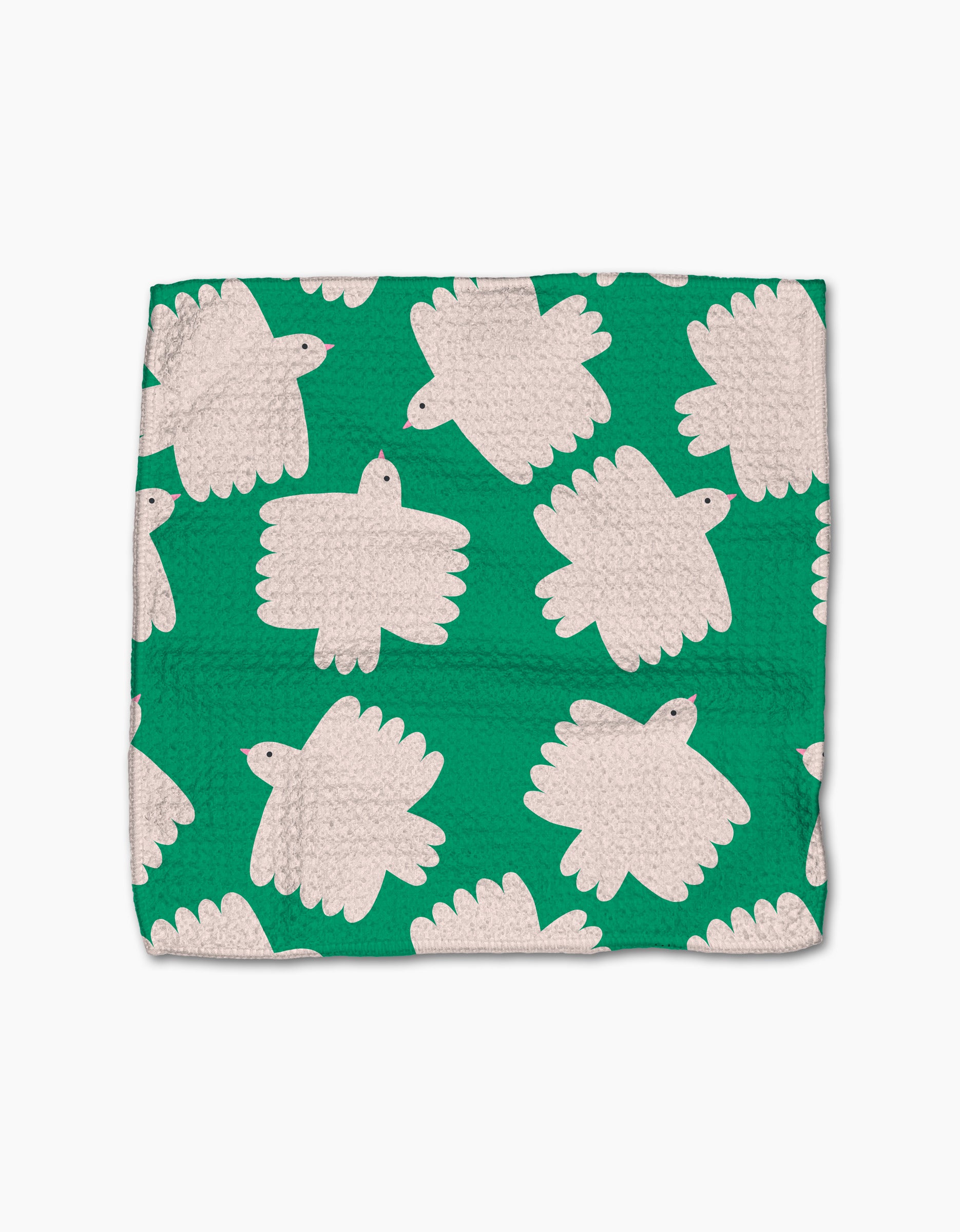 The Fluff and Feathers cloth napkin by Jennifer Bouron is made from Geoweave fabric and features a green background with white, stylized birds—rounded bodies, outstretched wings, and a simple black eye.