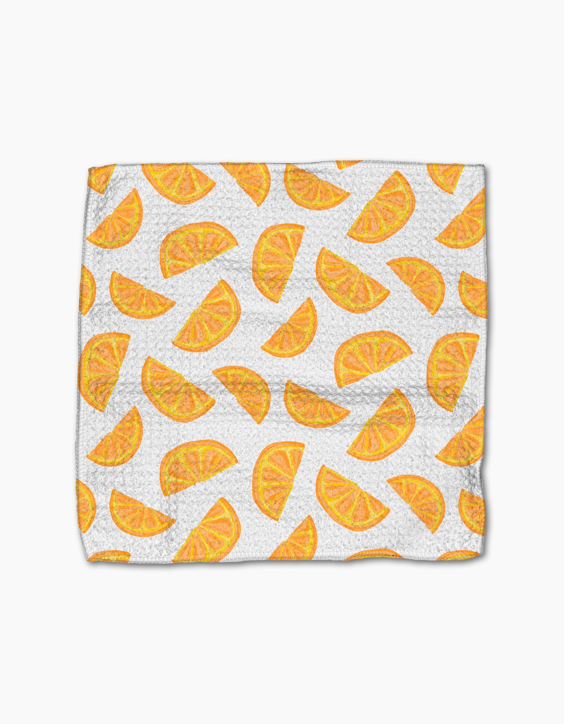 The Here Comes The Sun dishcloth by Aubrey Fairchild features a white textured Geoweave fabric with a repeating orange and yellow citrus slice pattern, offering super-absorbency, style, and functionality.