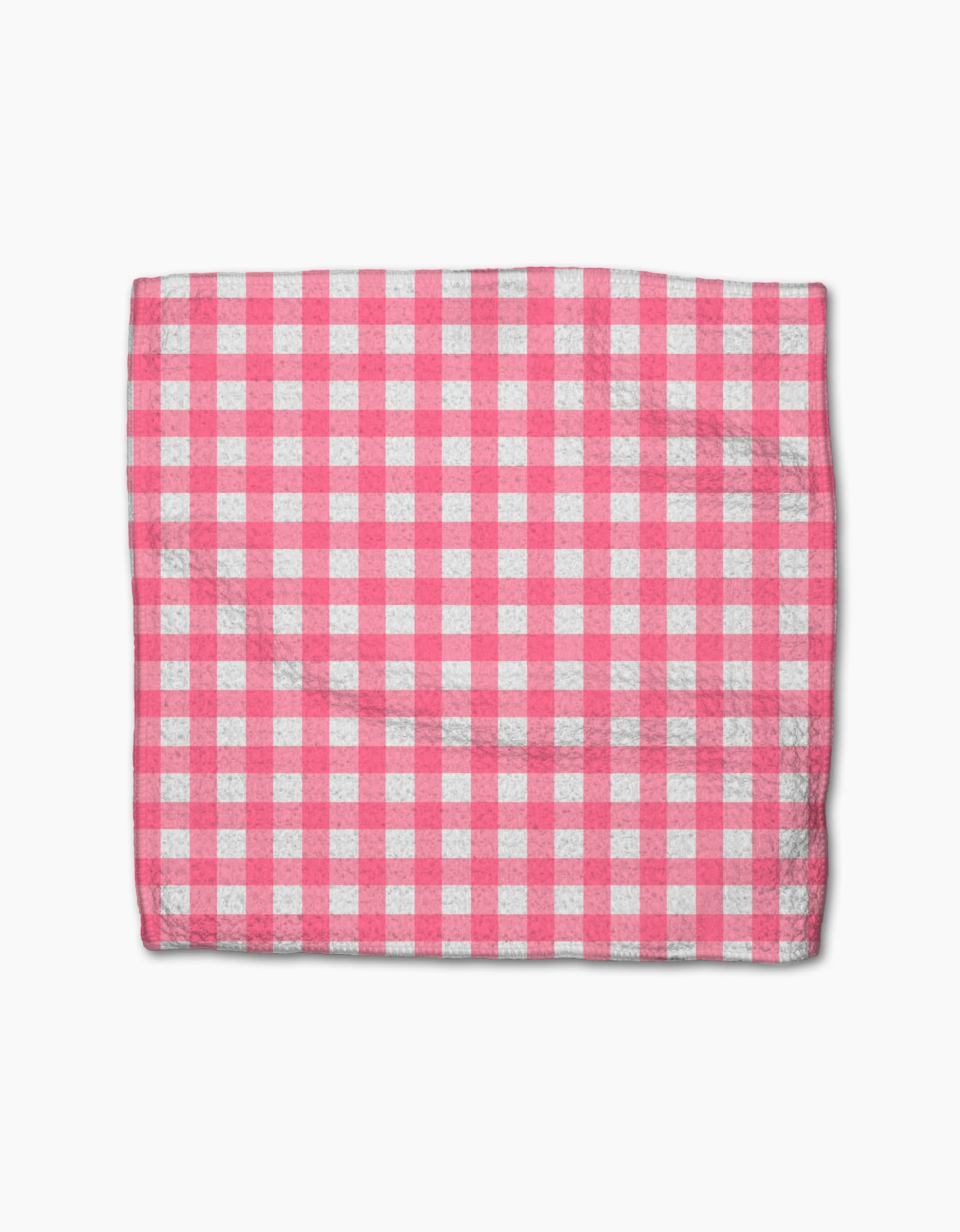 A rectangular Lemon Pop cloth from Ashley Celena’s super-absorbent dishcloth set, displaying a pink and white checkered gingham pattern, is laid flat on a white background.