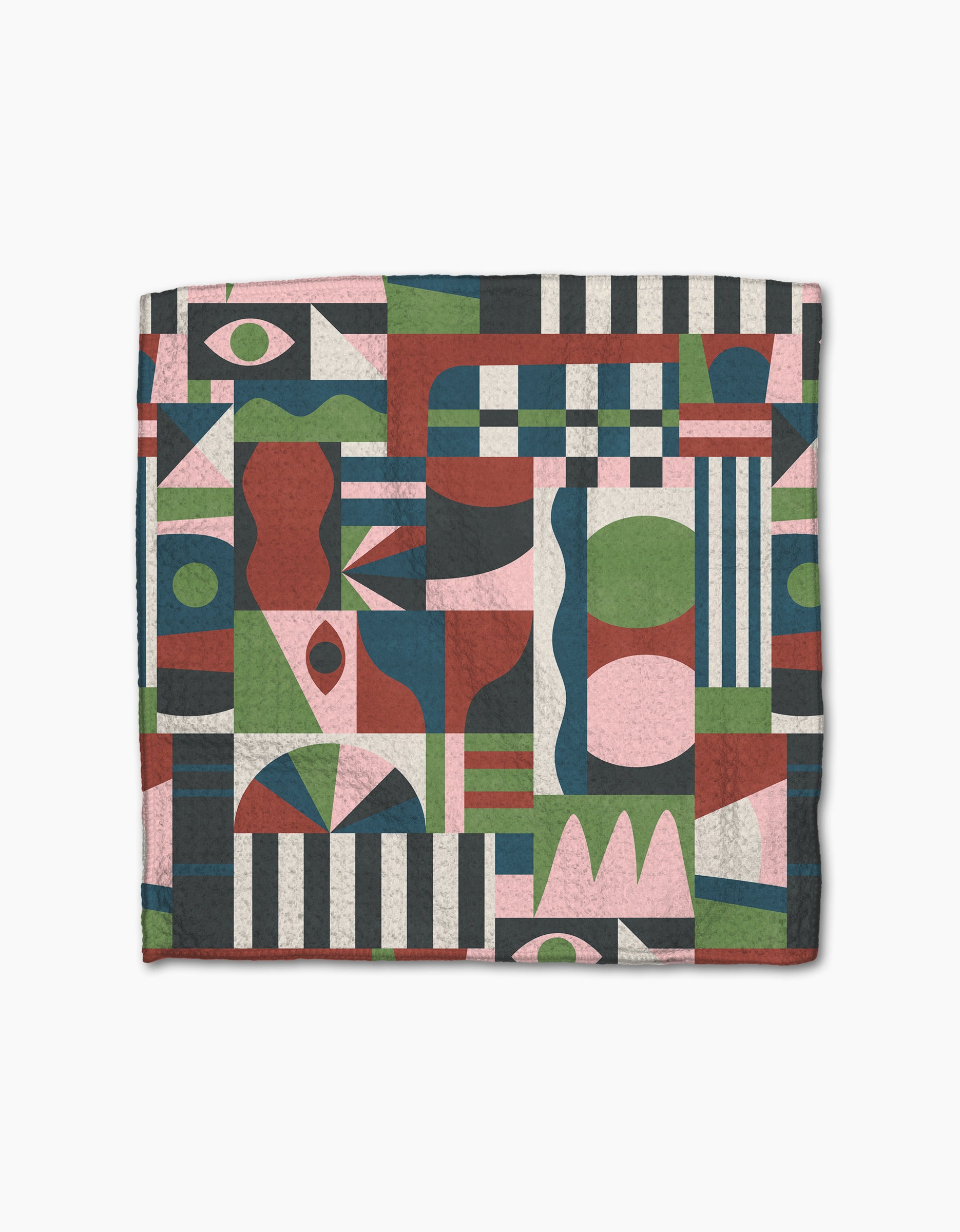 The Modern Bauhaus Mood quilt by Claire Iglesias features a colorful abstract geometric pattern in pink, green, navy, red, and cream—crafted from soft recycled Geoweave fabric.