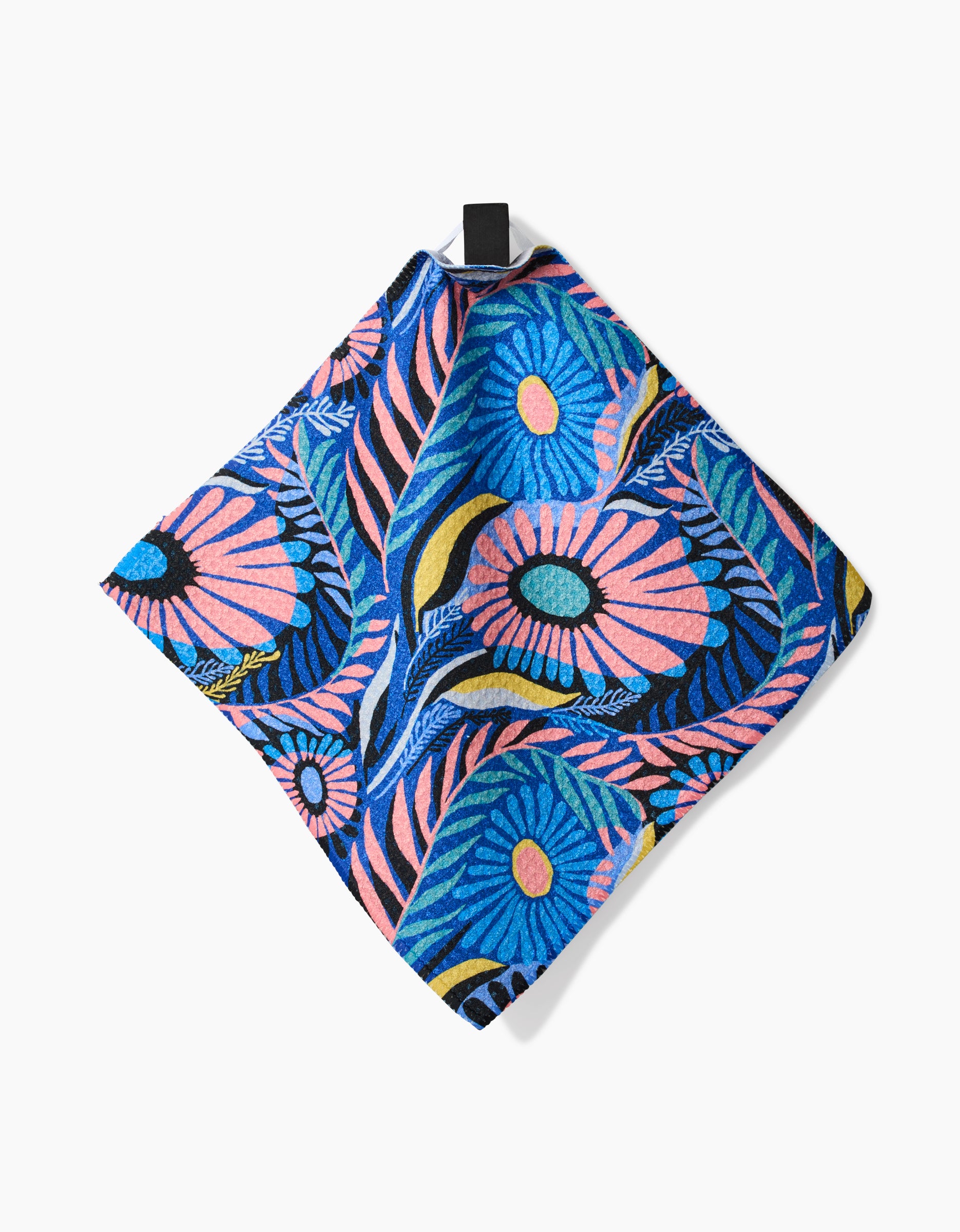 The Palm Beach dishcloth by Masha Volnova features a vibrant floral pattern in blue, pink, green, and yellow on soft Geoweave fabric. Its square-shaped, eco-friendly, and includes a black hanging loop at the top.