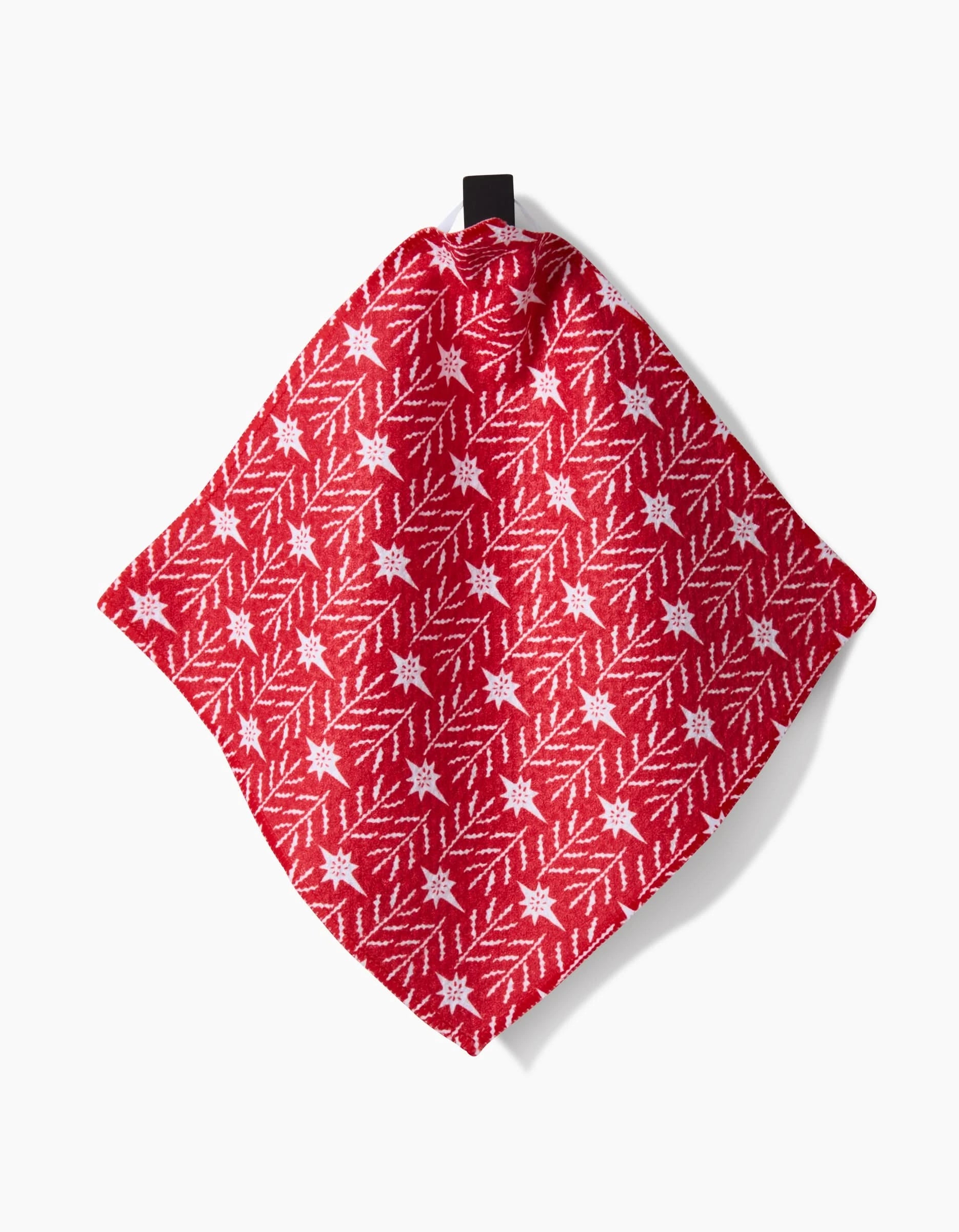 The Peace And Love To All kitchen towel by Roxy Marj features a red design with white snowflake and branch patterns, made from recycled materials, hanging from a black loop against a white background.