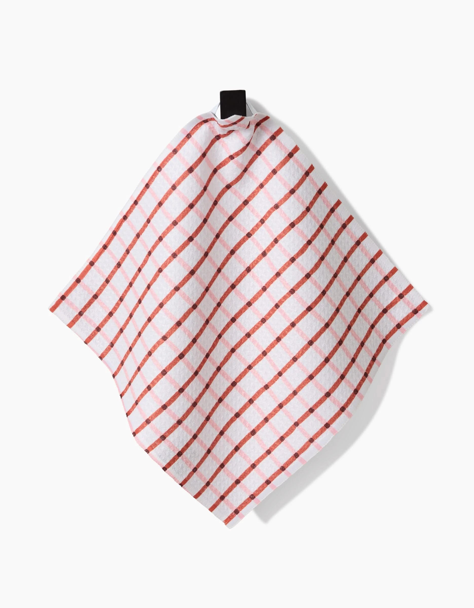 The Playful Retro kitchen towel by Teri the Butter, featuring a red checkered pattern on Geoweave fabric, hangs from a black loop against a plain white background.