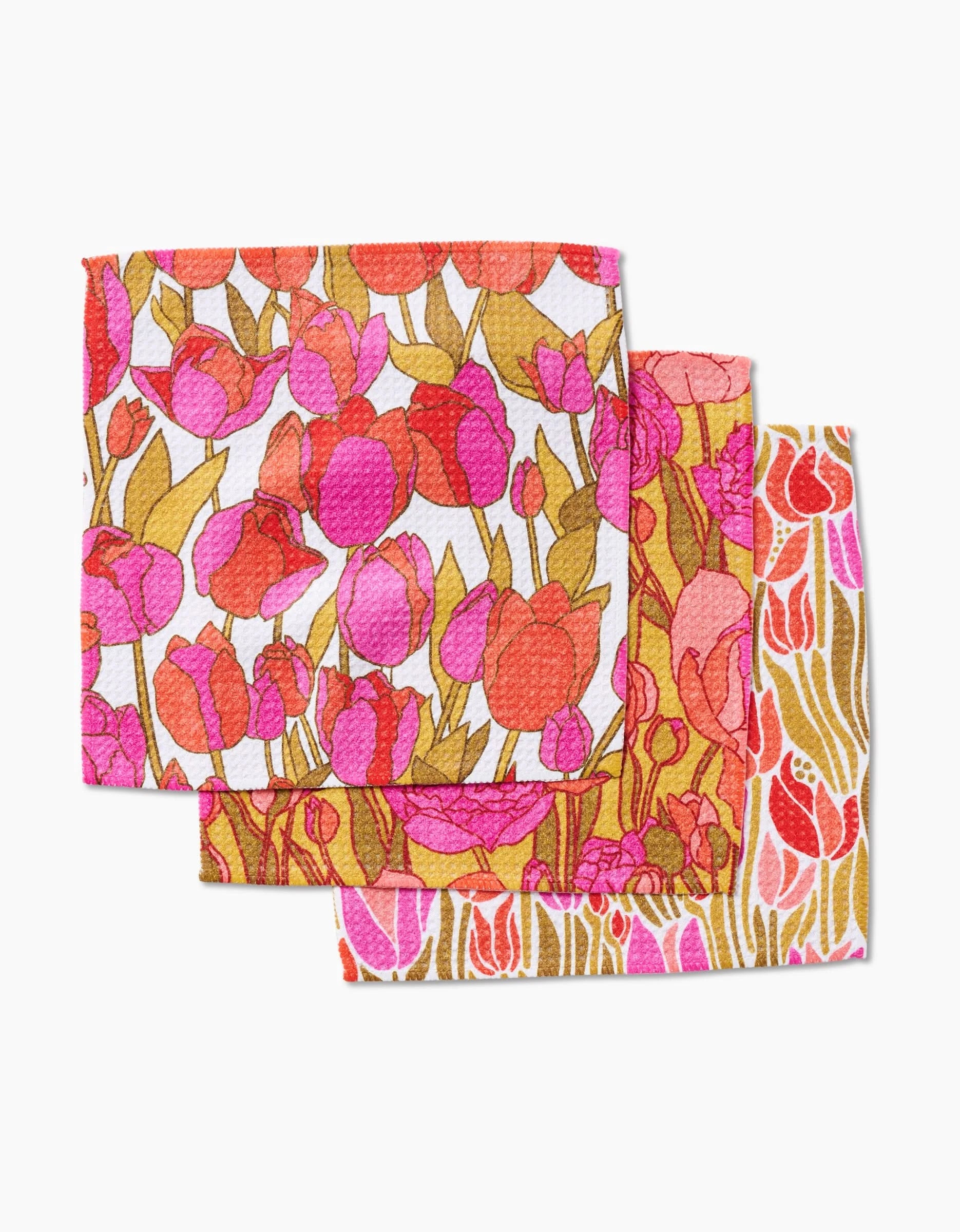 Sidney by Amy MacCready features three vibrant dishcloths with bold red, pink, and orange tulip designs on a white background, crafted from premium Geoweave fabric for superior absorbency.